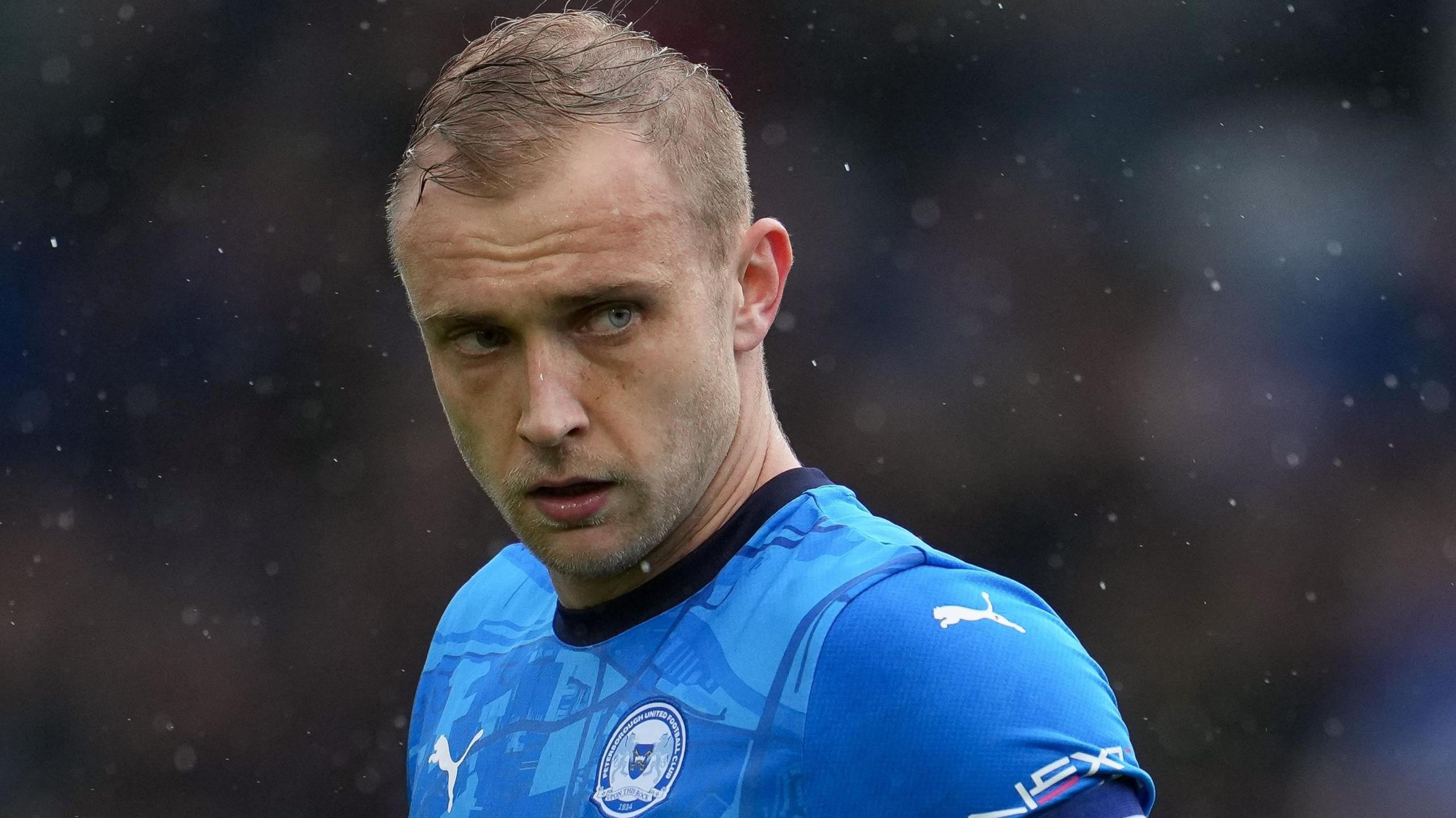 Sam Hughes playing for Peterborough United against Charlton Athletic