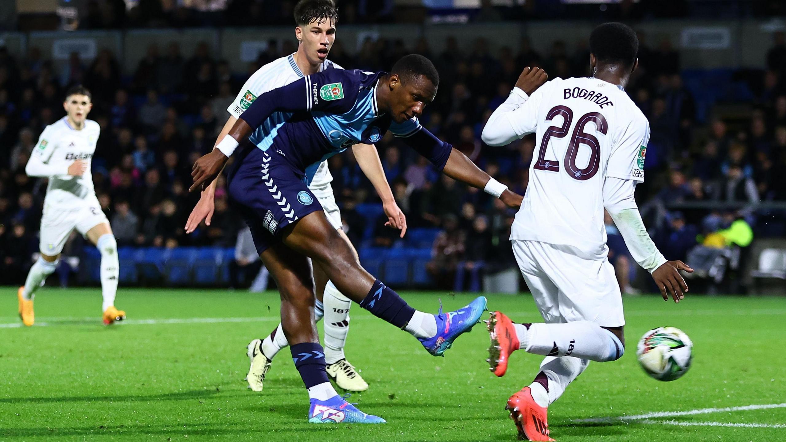 Wycombe forward Richard Kone, signed from non-league football last season, shoots for goal