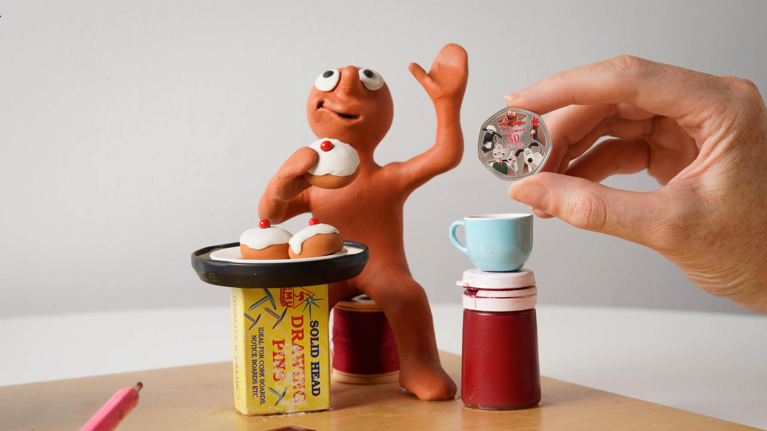 Morph with the new Royal Mint 50 Years of Aardman 50p. 
