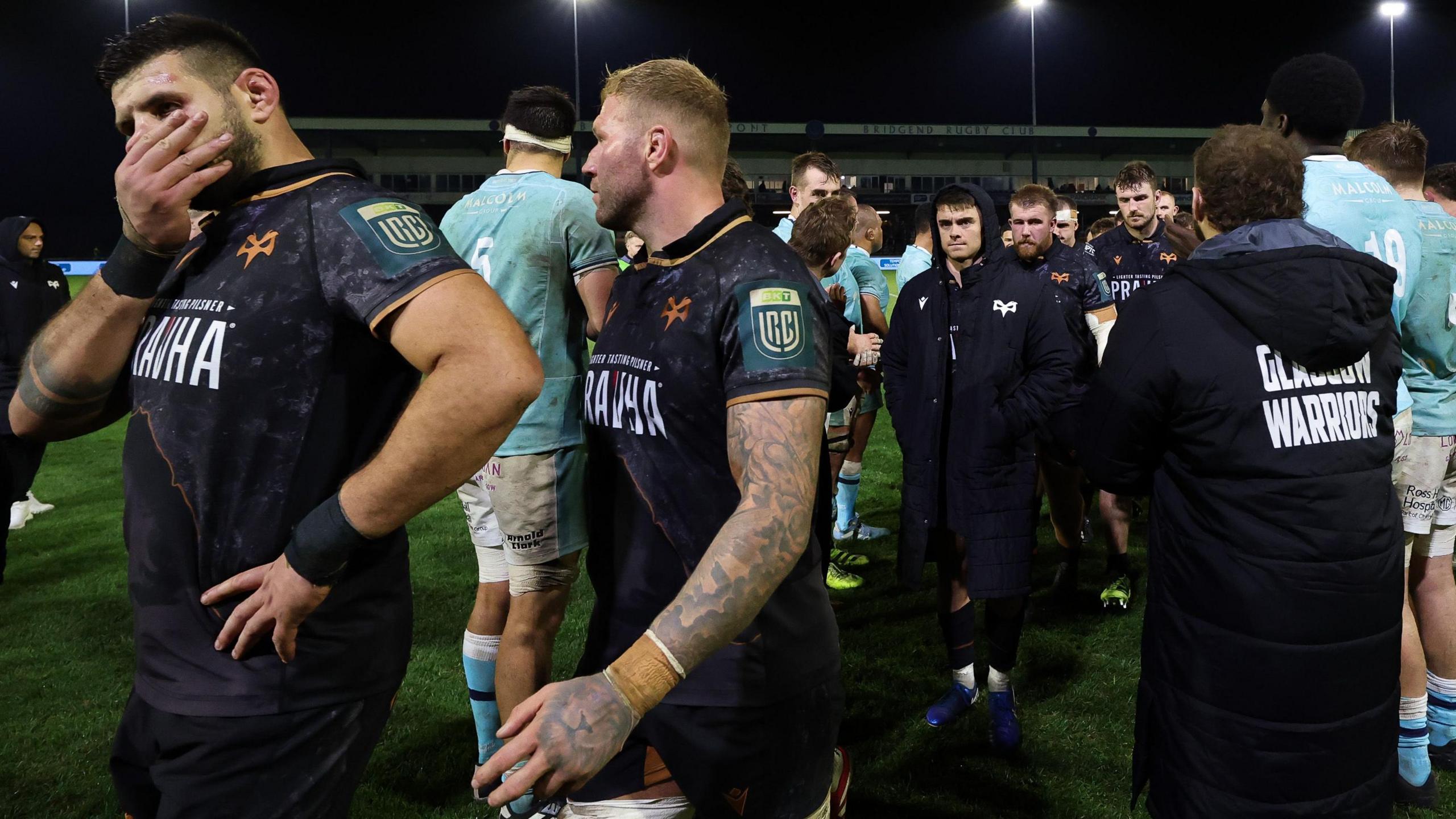 Ospreys players look dejected after losing to Glasgow