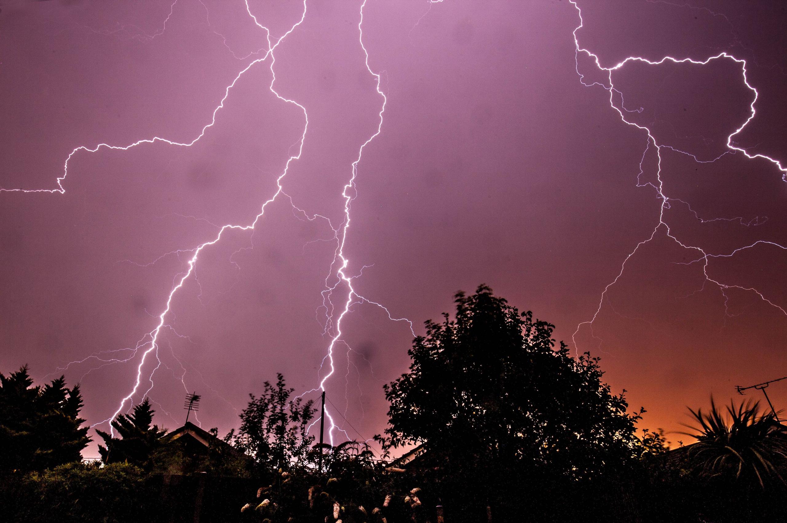 Lightning flashes across the nights sky.