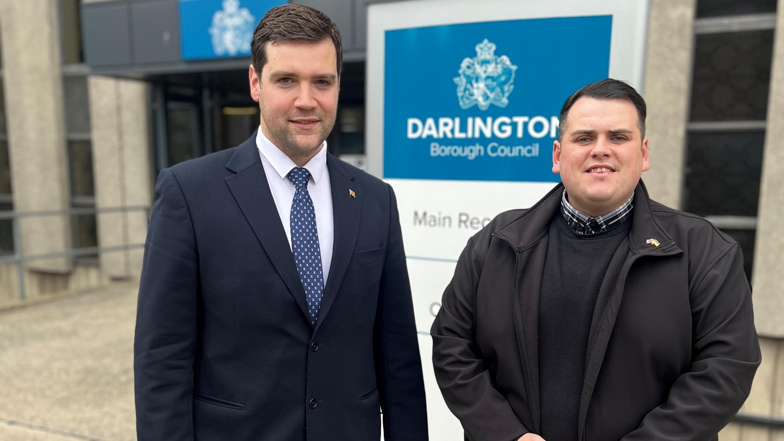 Mike Renton And Jonathan Dulston stand outside council office