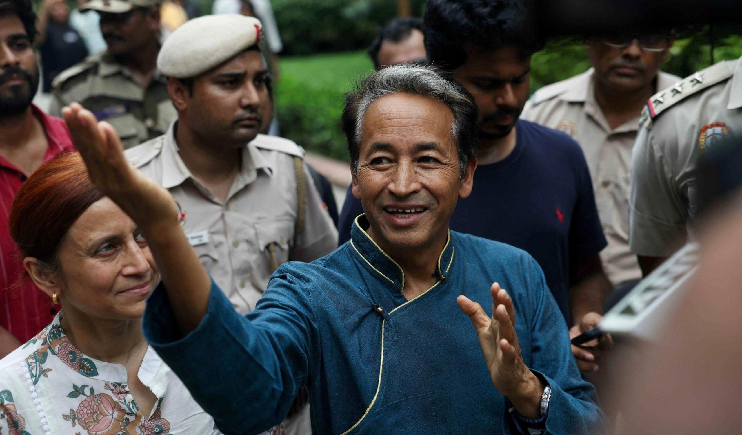 Sonam Wangchuk, an education activist who was on a hunger strike for 26 days to support the demand for resignation of India’s education minister, walks after paying homage at the Mahatma Gandhi memorial at Rajghat in New Delhi, India