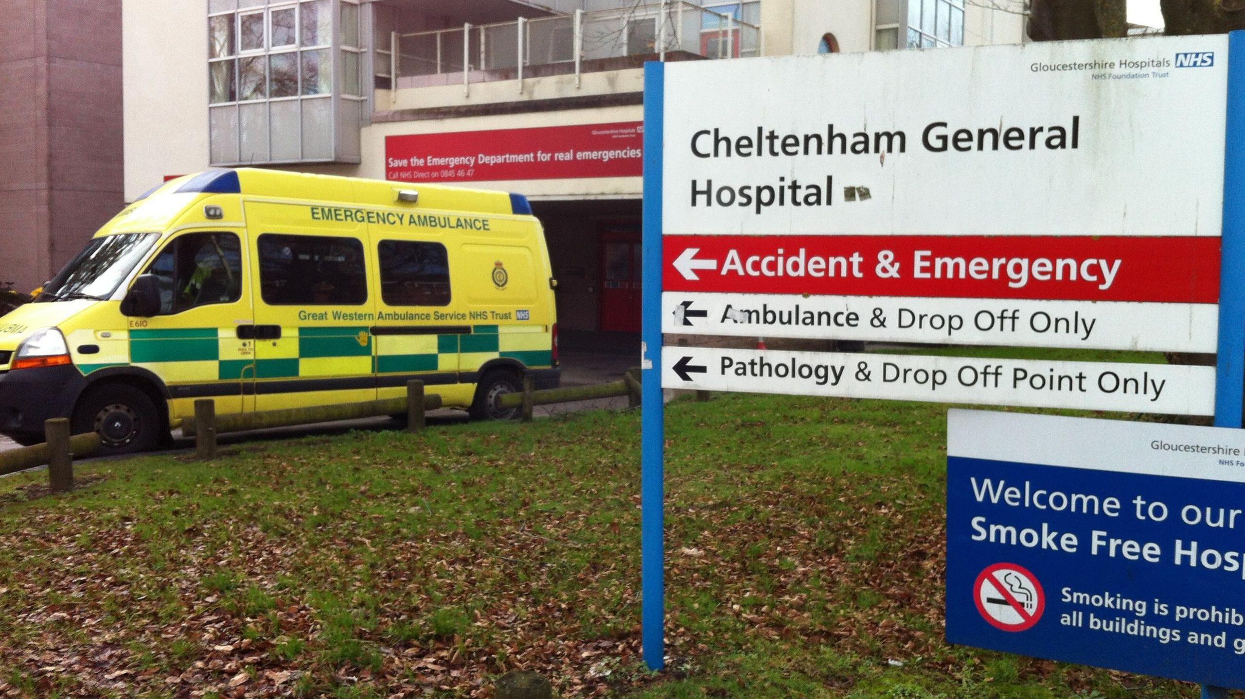 Ambulance outside Cheltenham General Hospital, parked next to a hospital sign