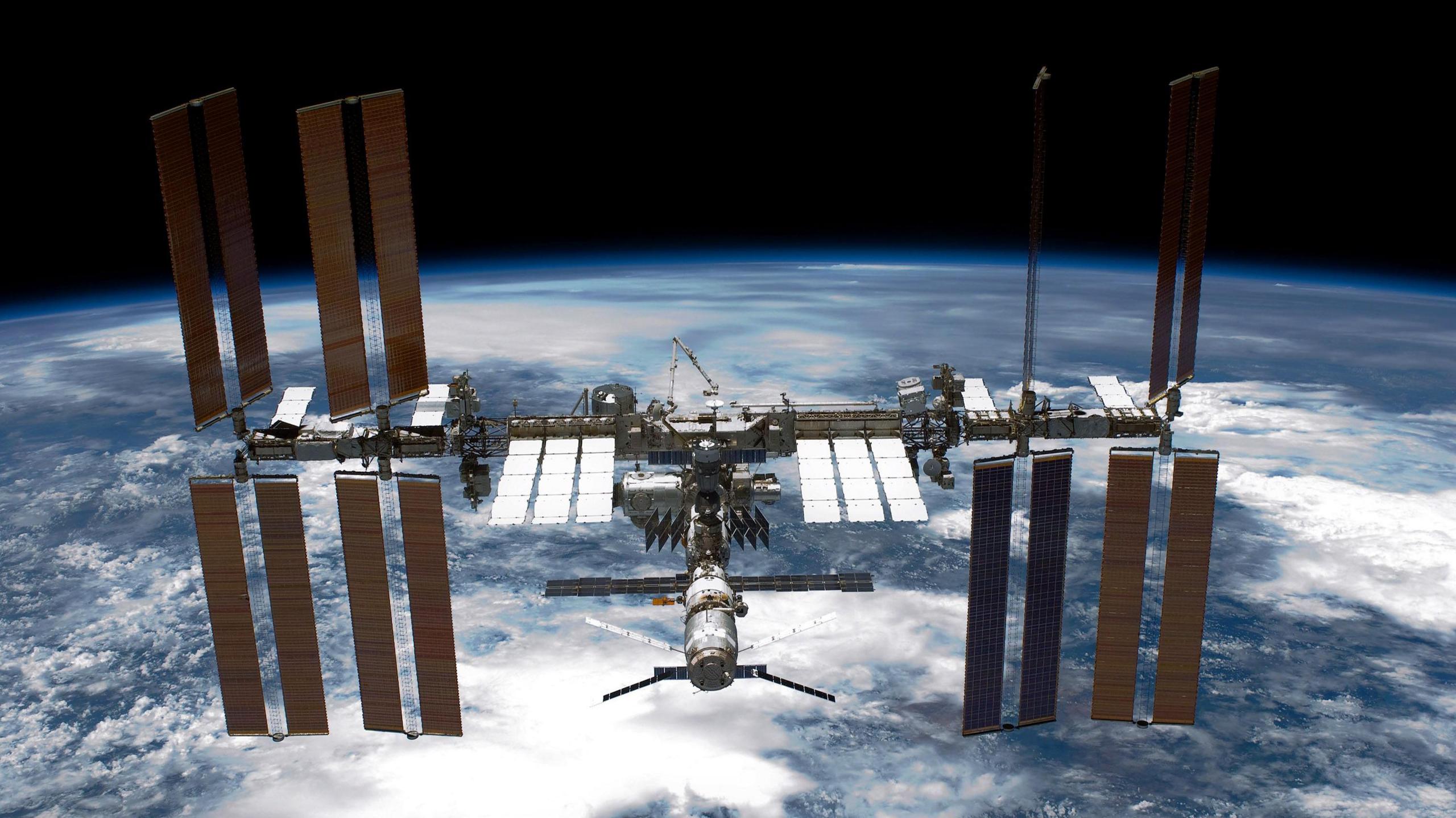 The International Space Station (ISS) is seen from NASA space shuttle Endeavour above Earth in 2011 in space.