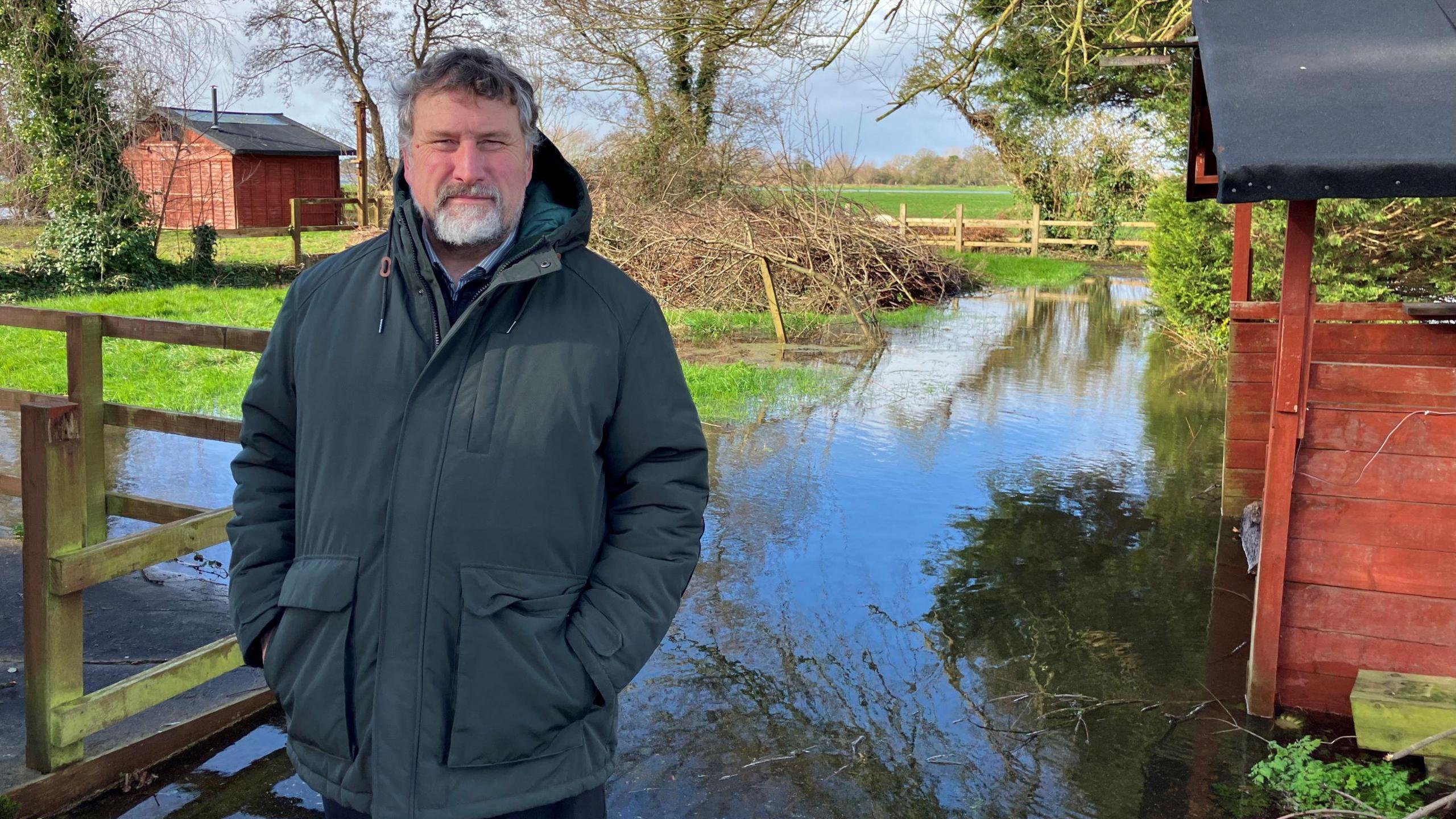 Lynton Smith in his flooded garden