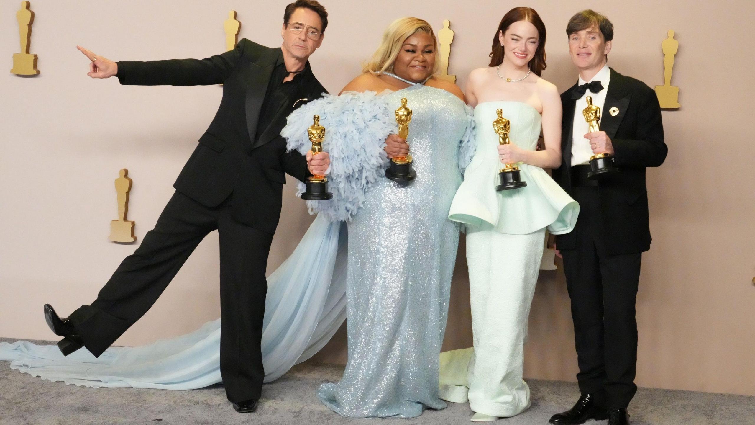 Robert Downey Jr, Da'Vine Joy Randolph, Emma Stone and Cillian Murphy together at last year's Oscars in evening dress