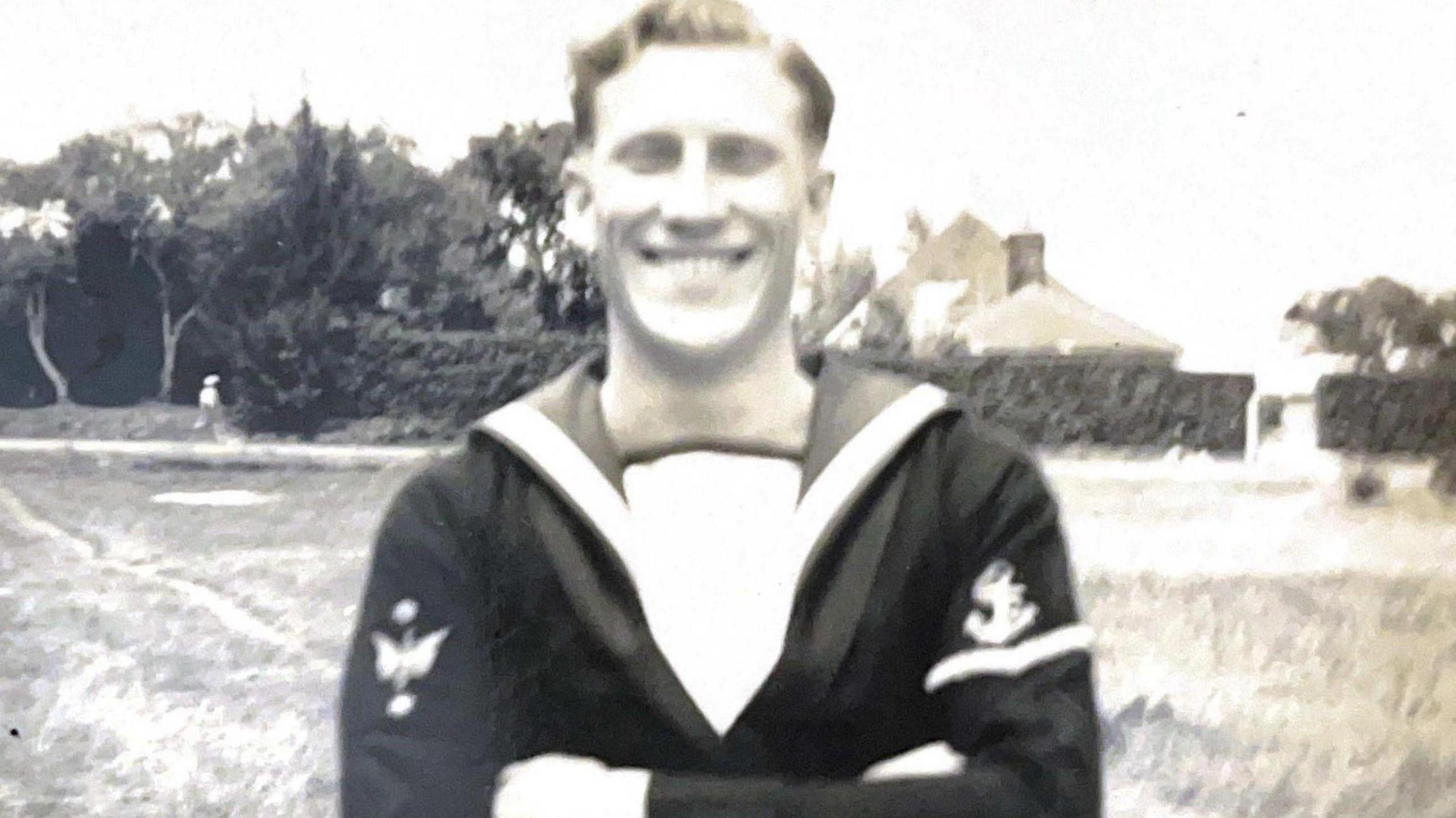 A very old photo ofJohn Daniels in Navy uniform