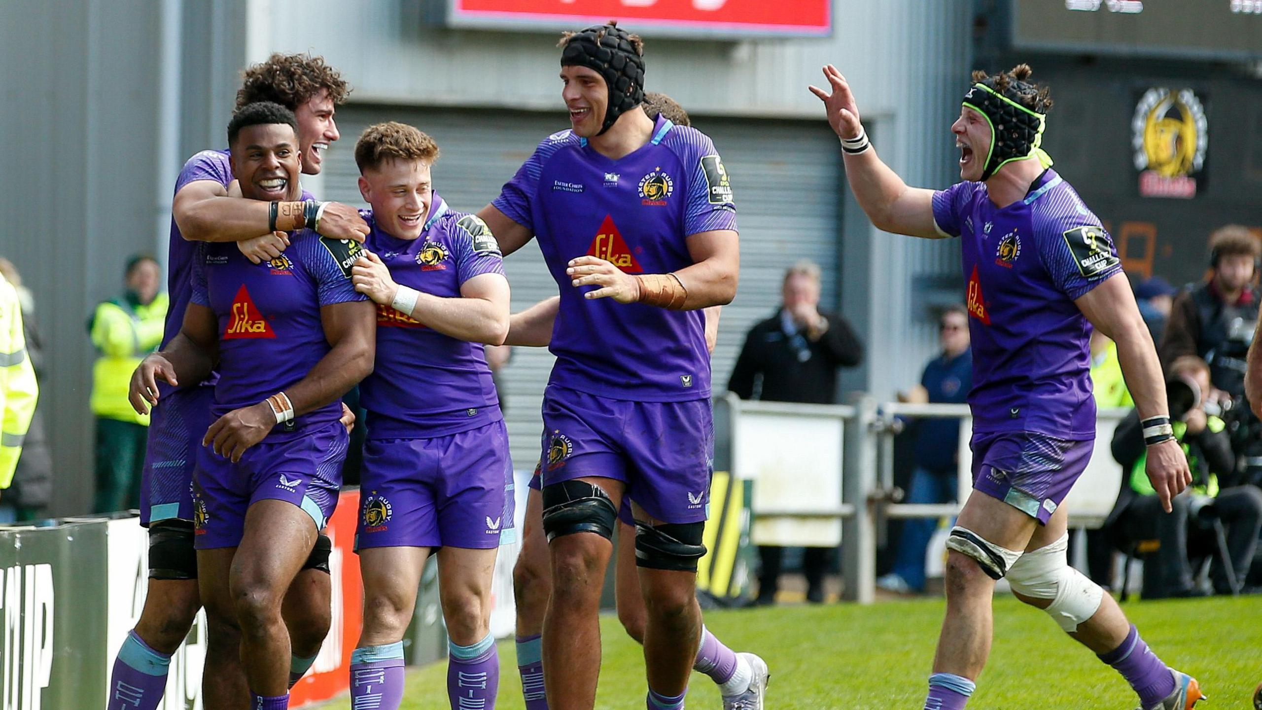 Exeter Chiefs players celebrate a try