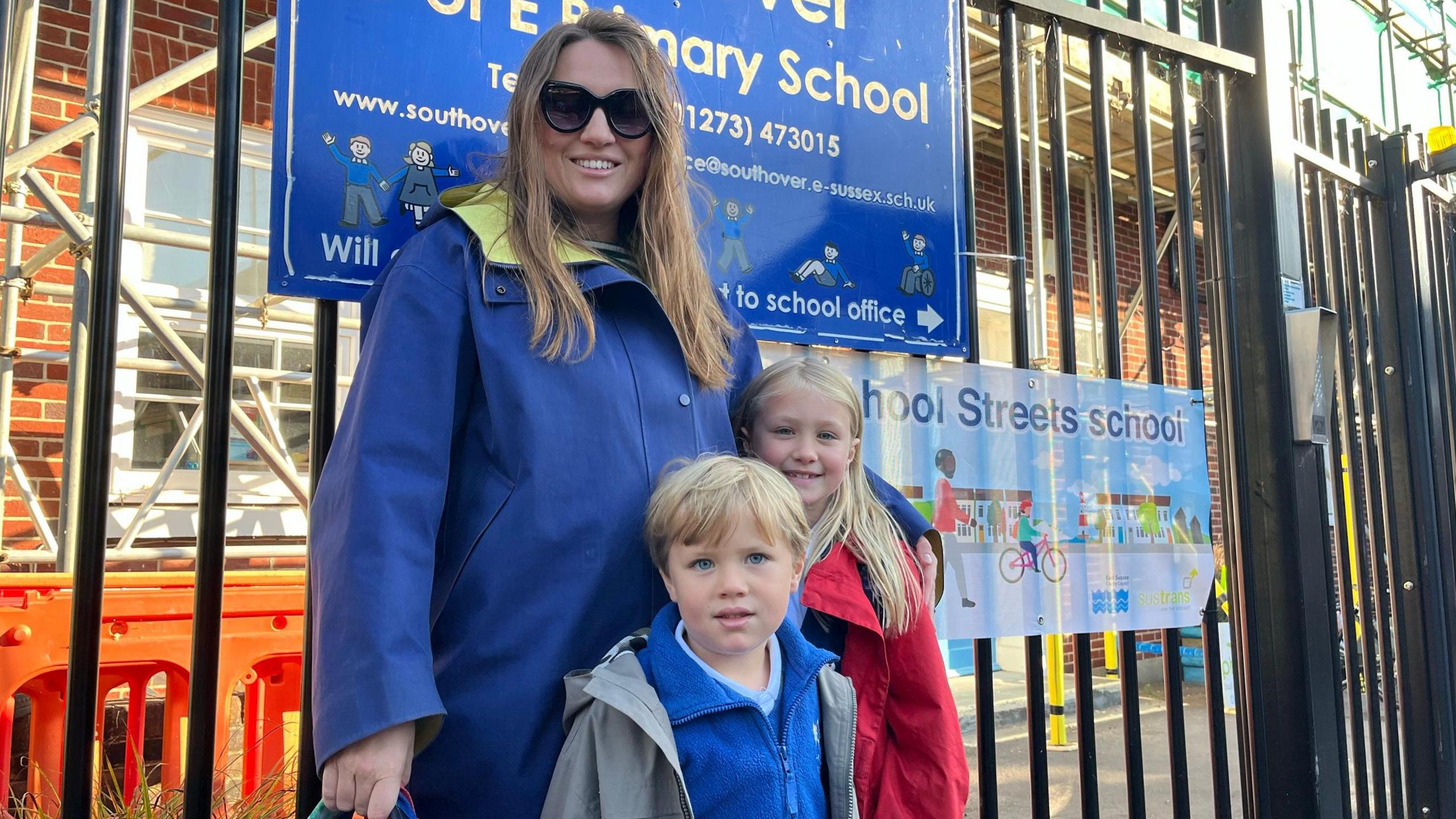 Parent Rebecca Scott with her children outside Southover Primary School