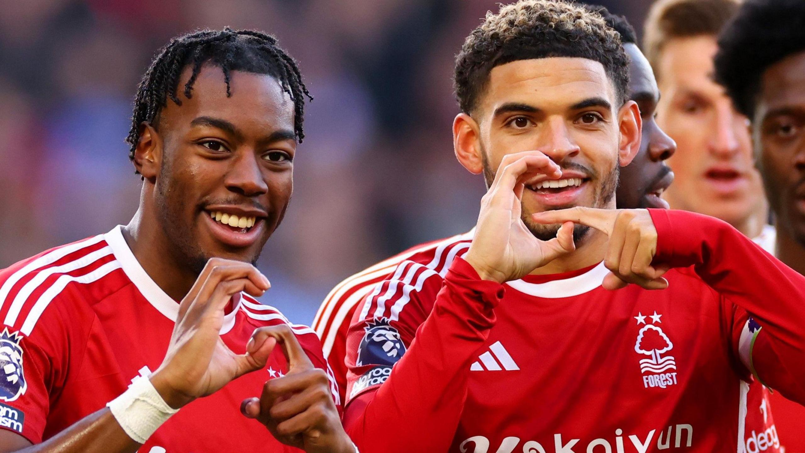Anthony Elanga and Morgan Gibbs-White celebrate a goal