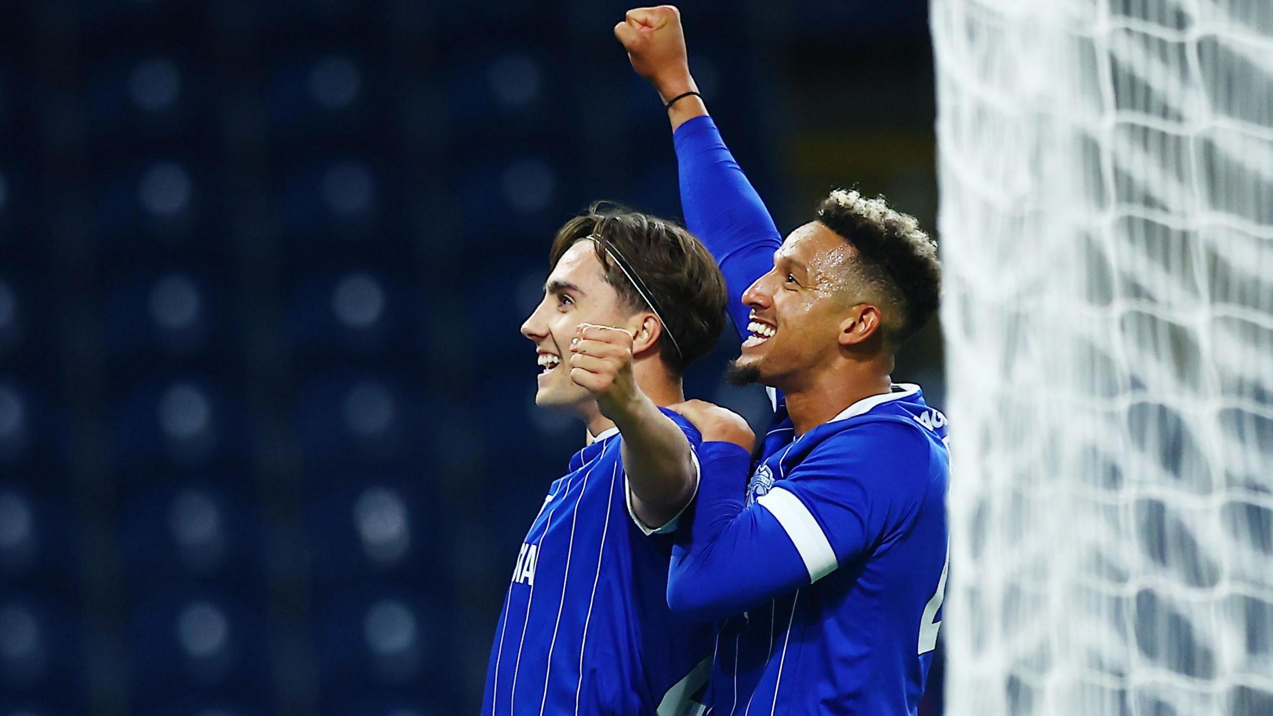 Joel Colwill (left) of Cardiff City celebrates scoring the opening goal with Callum Robinson