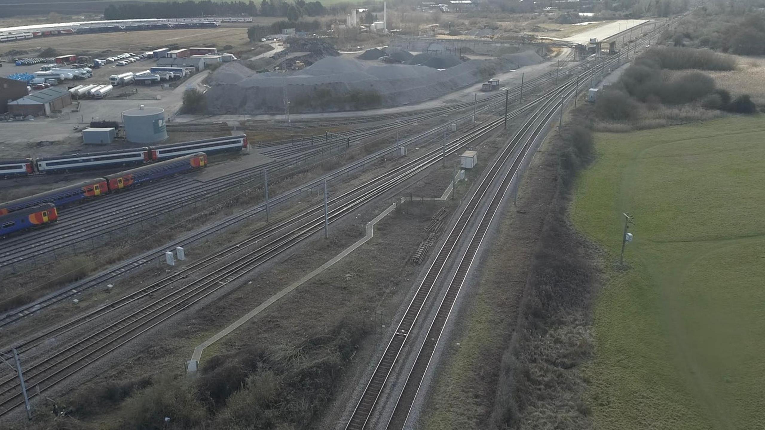 An aerial view of Ely North junction showing rail lines converging on the junction