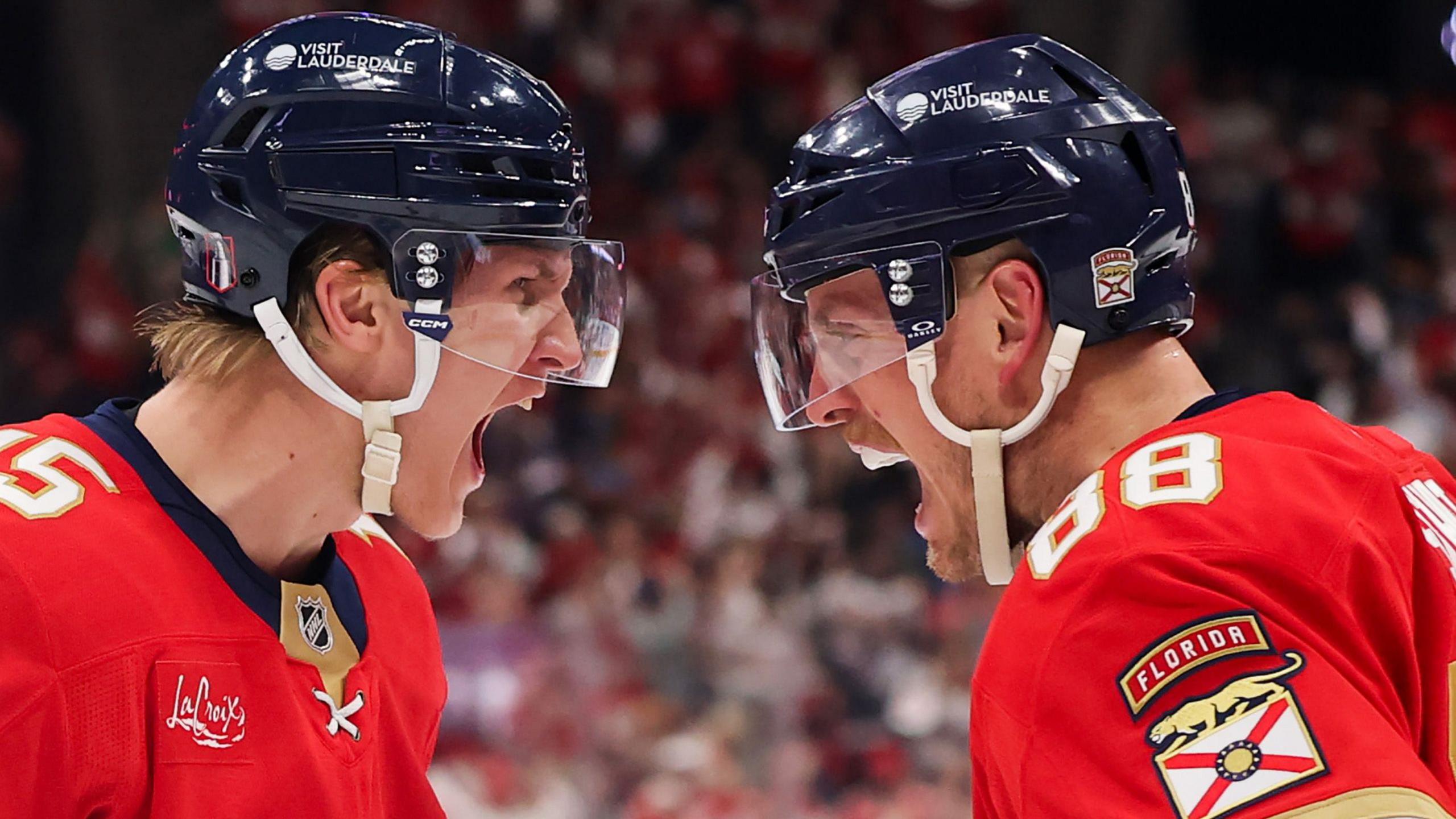 Florida Panthers' Anton Lundell celebrates with Nate Schmidt after scoring a goal against the Tampa Bay Lightning during the second period in Game Four of the First Round of the 2025 Stanley Cup Playoffs at Amerant Bank Arena in Sunrise, Florida