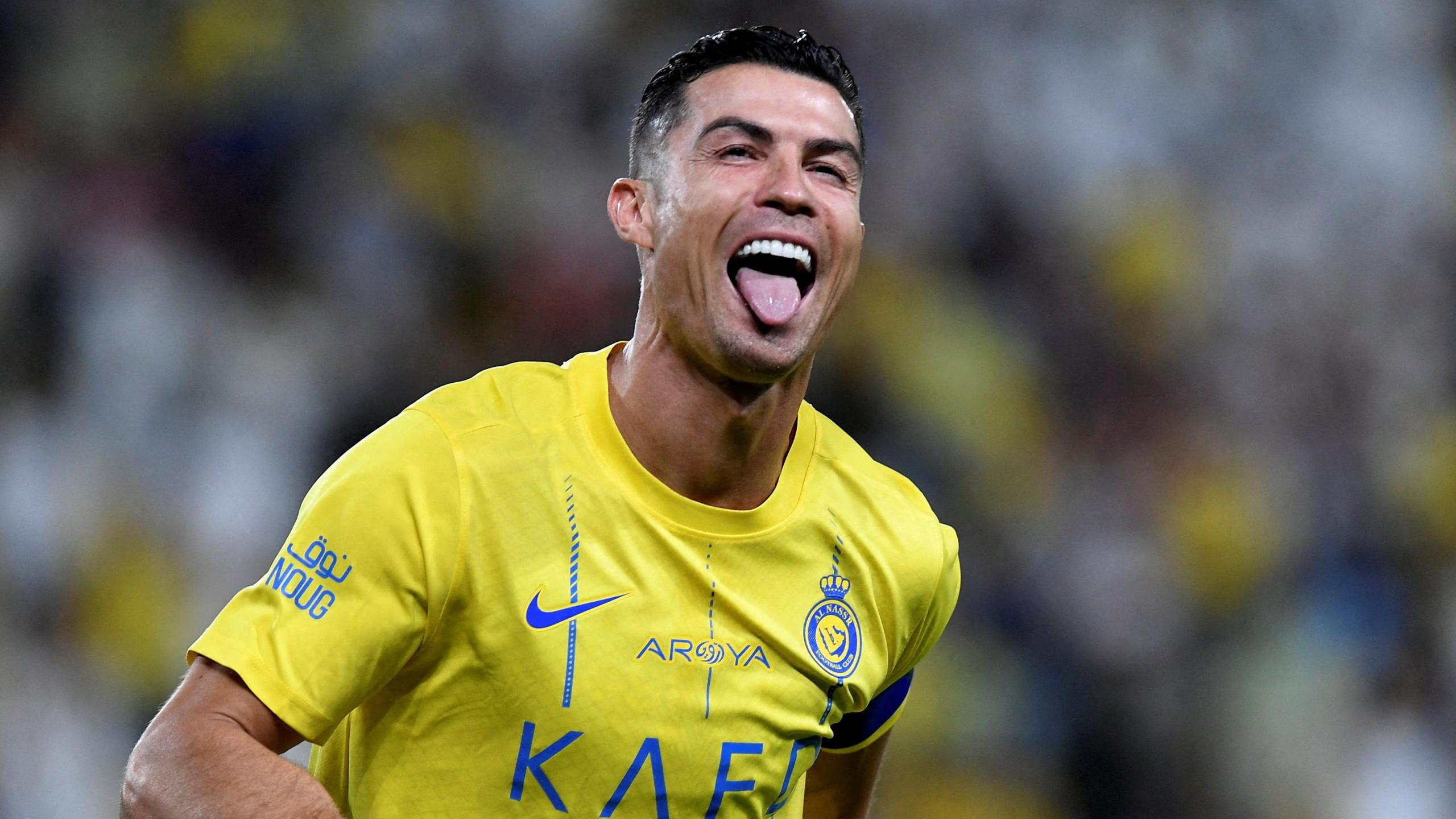 Cristiano Ronaldo celebrates scoring for Al Nassr in a match in May 2024 against Al Wehda at Al-Awwal Stadium in Riyadh, Saudi Arabia 
