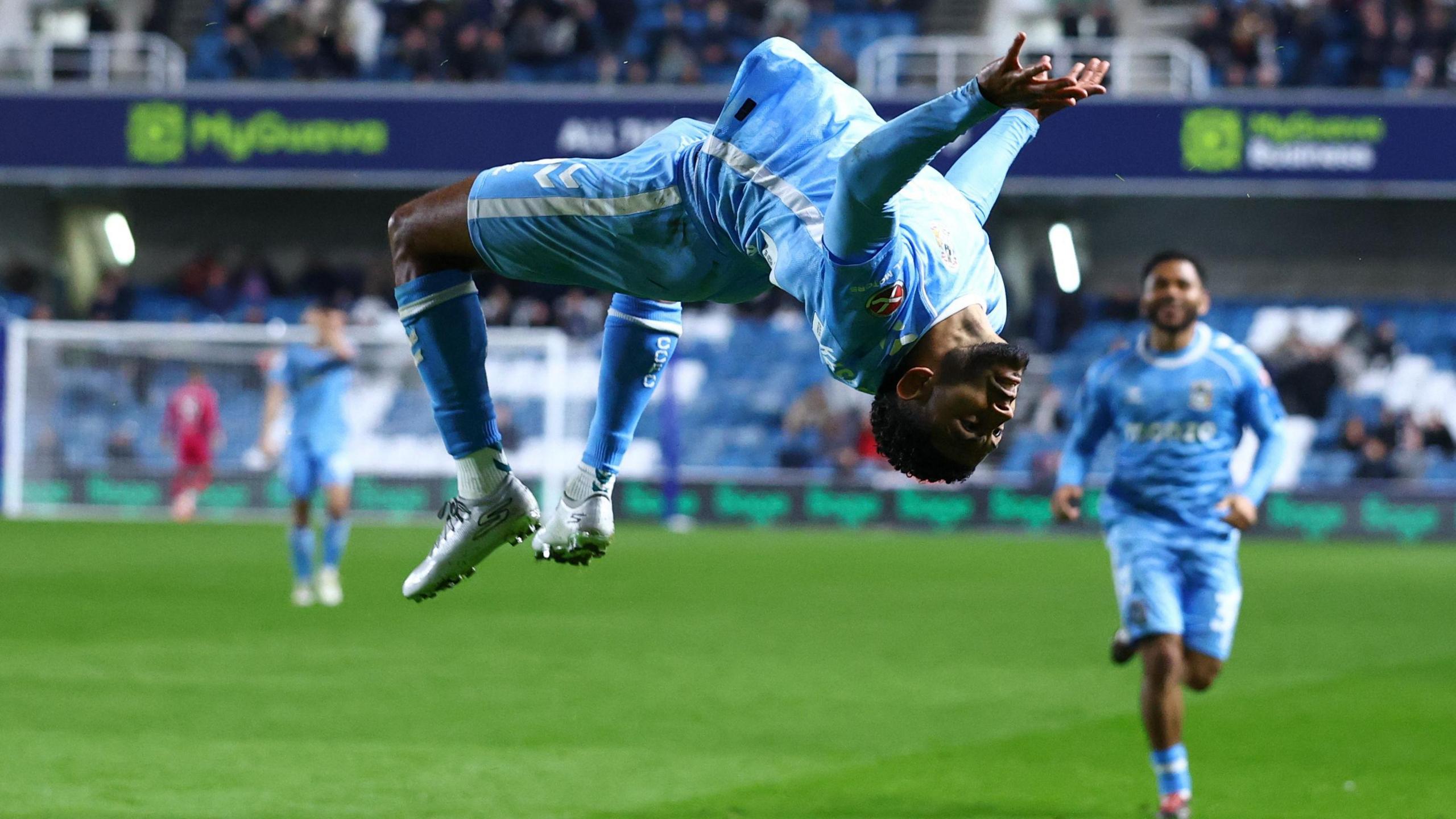 Kaine Kesler-Hayden does a double backflip in celebration at scoring for Coventry City