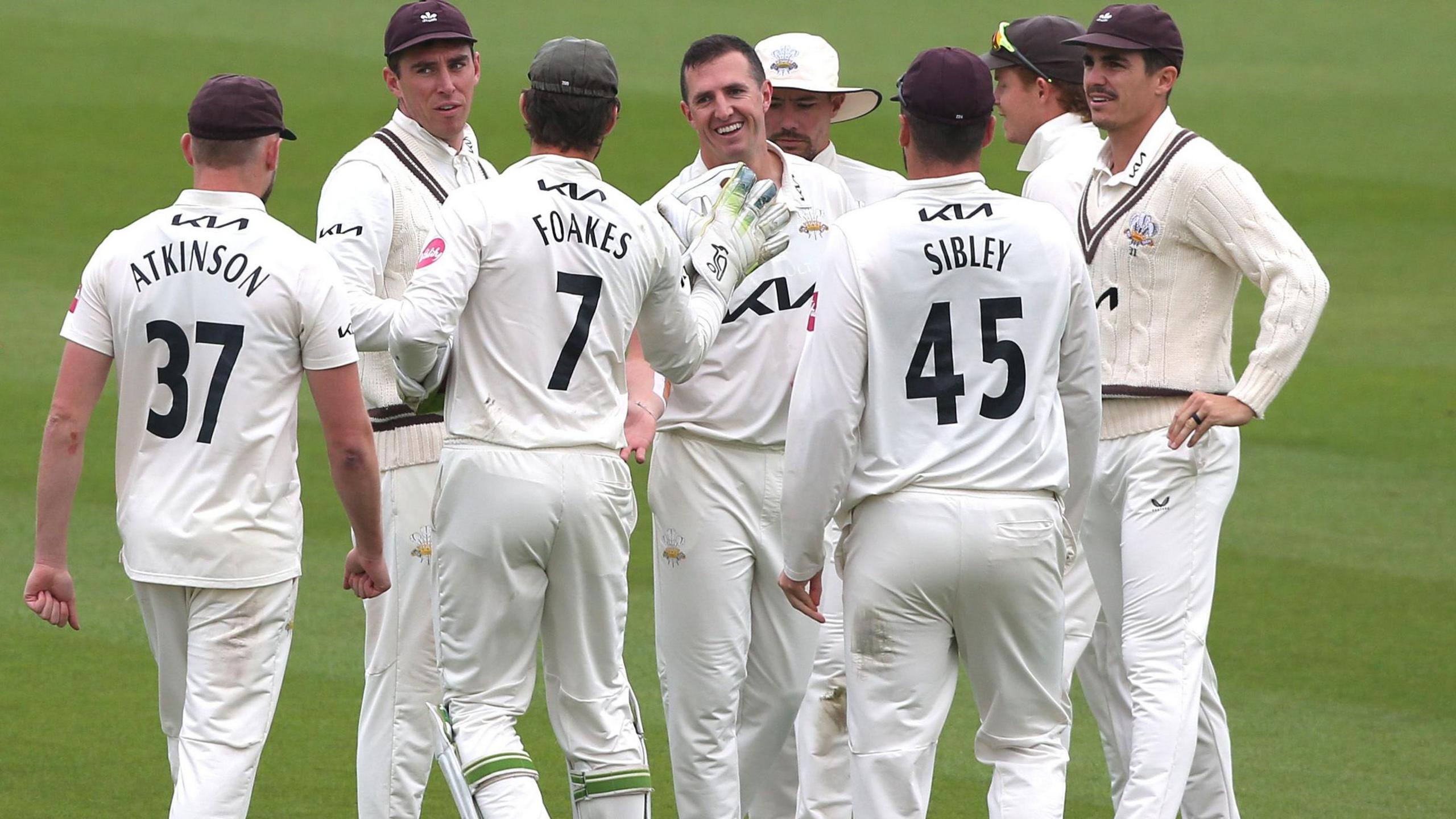 Surrey celebrate taking wicket