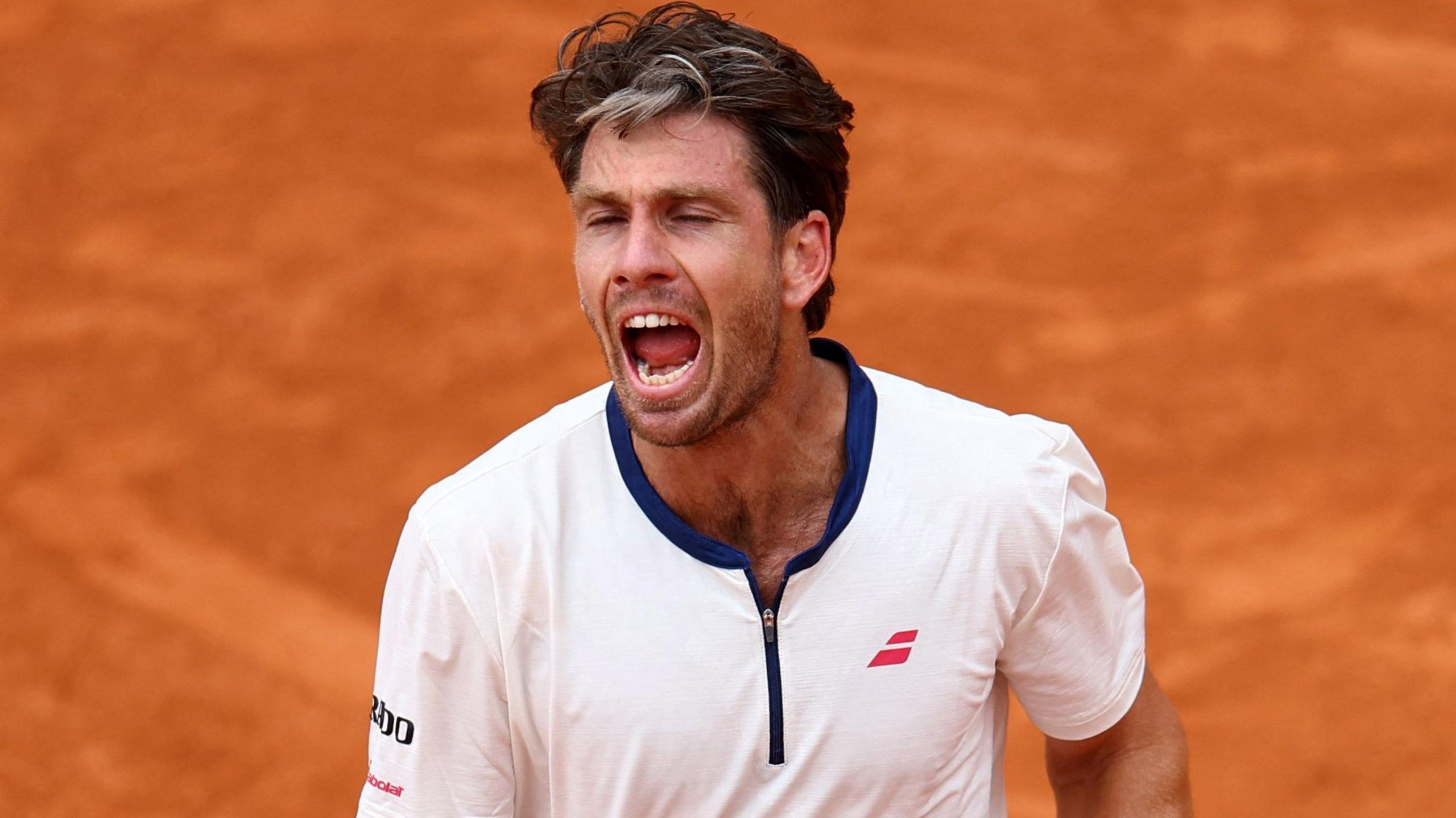 Cameron Norrie reacts to missing a point against Daniil Medvedev at the French Open