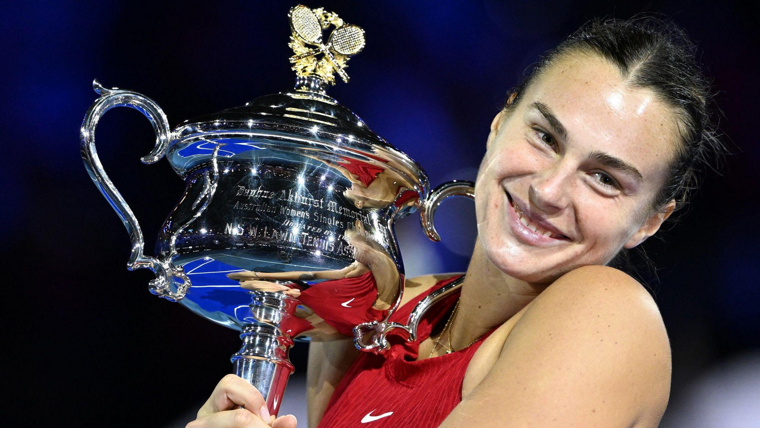 Aryna Sabalenka with the Australian Open trophy