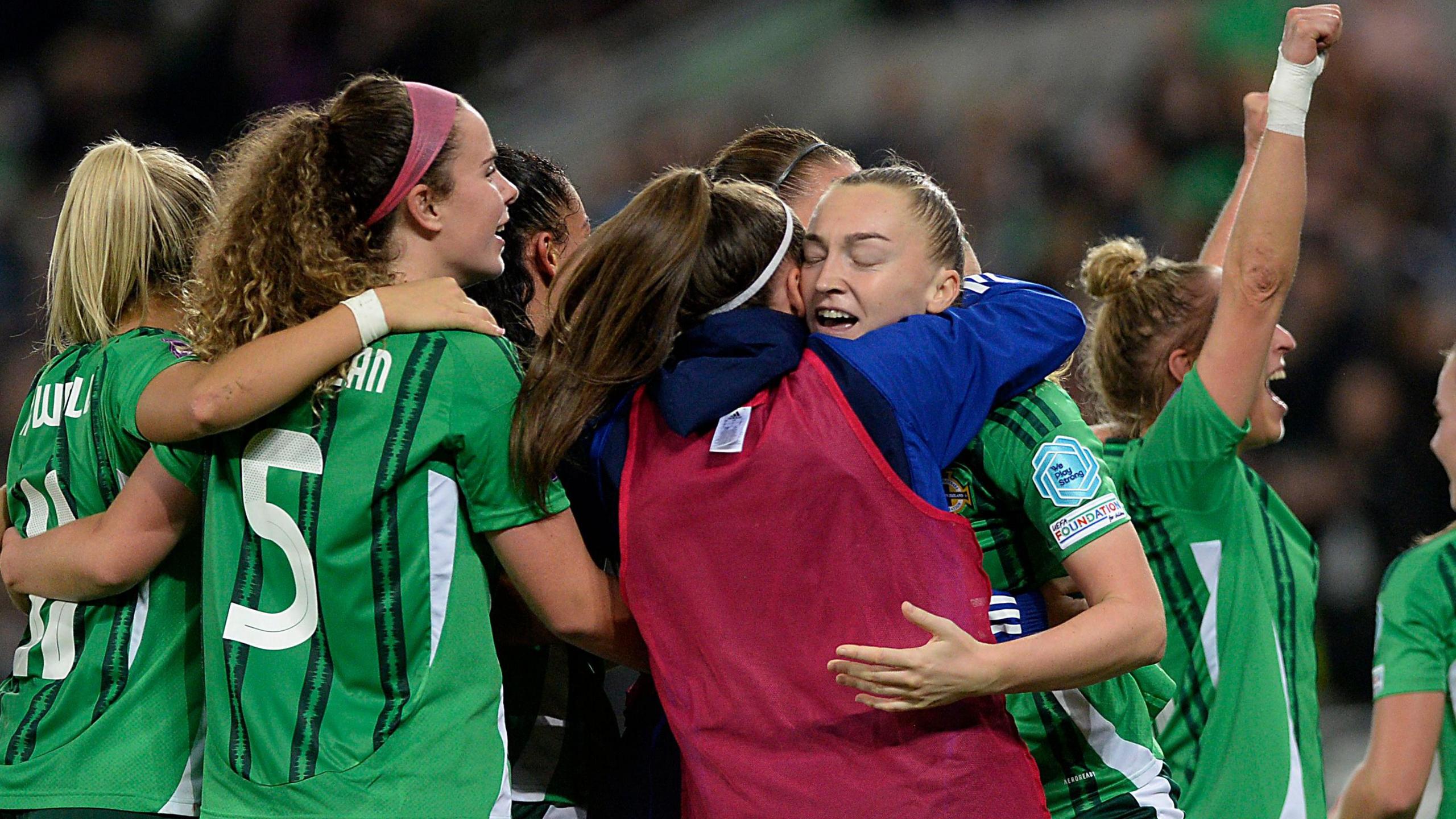 Lauren Wade celebrates with Northern Ireland team-mates