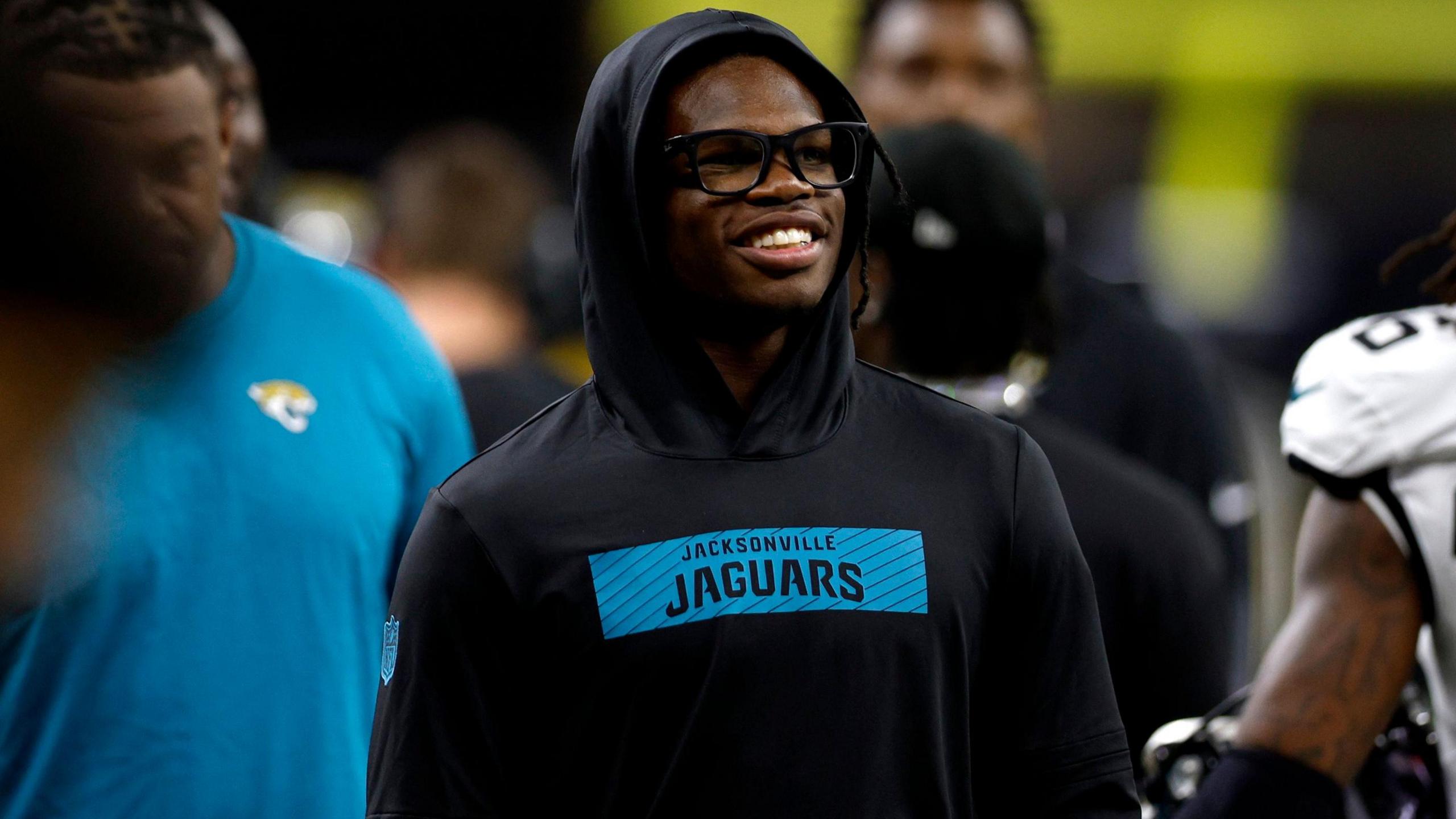 Travis Hunter watches on from the sidelines as his team the Jacksonville Jaguars play a NFL pre-season game