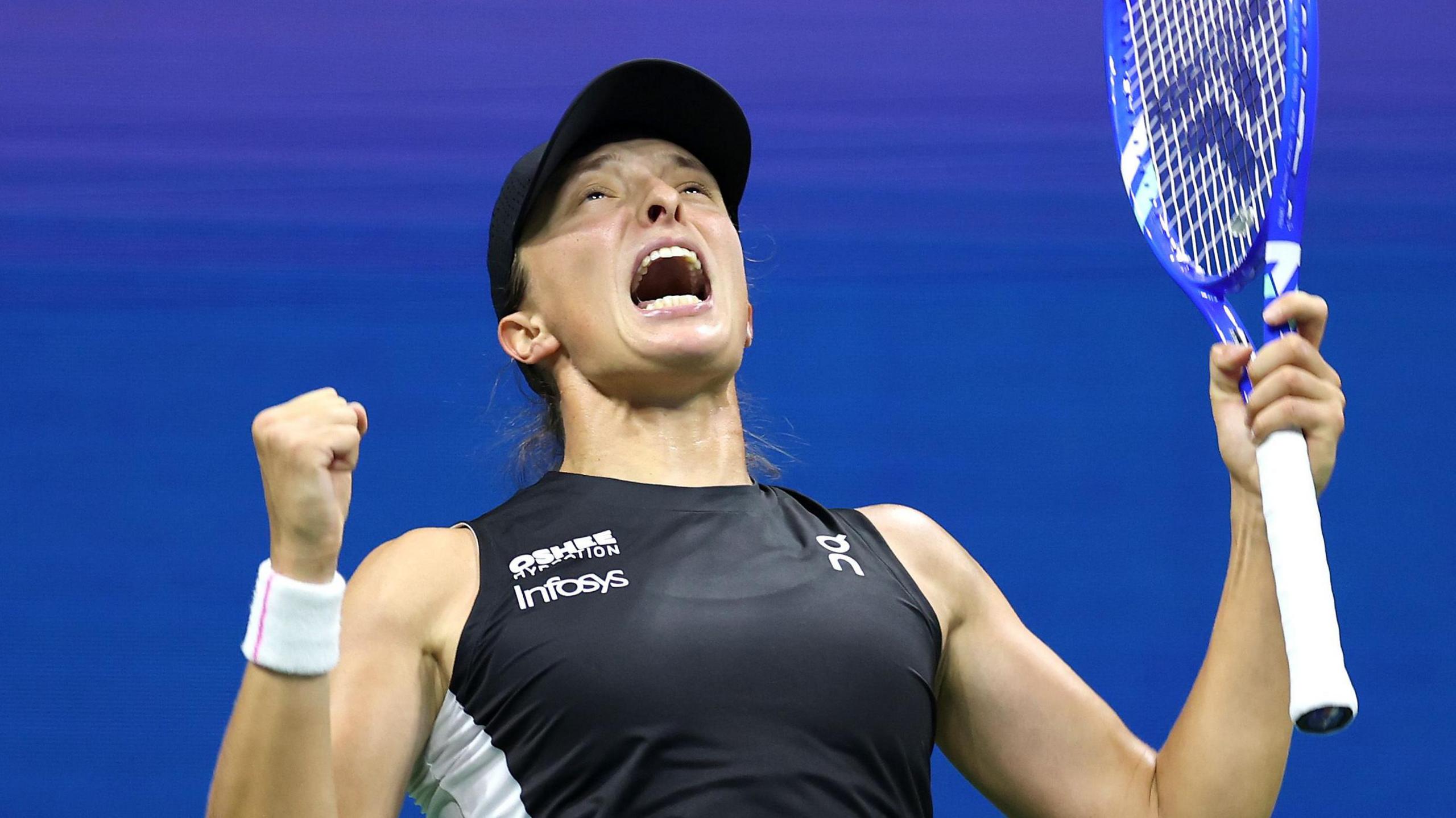 Iga Swiatek celebrates
