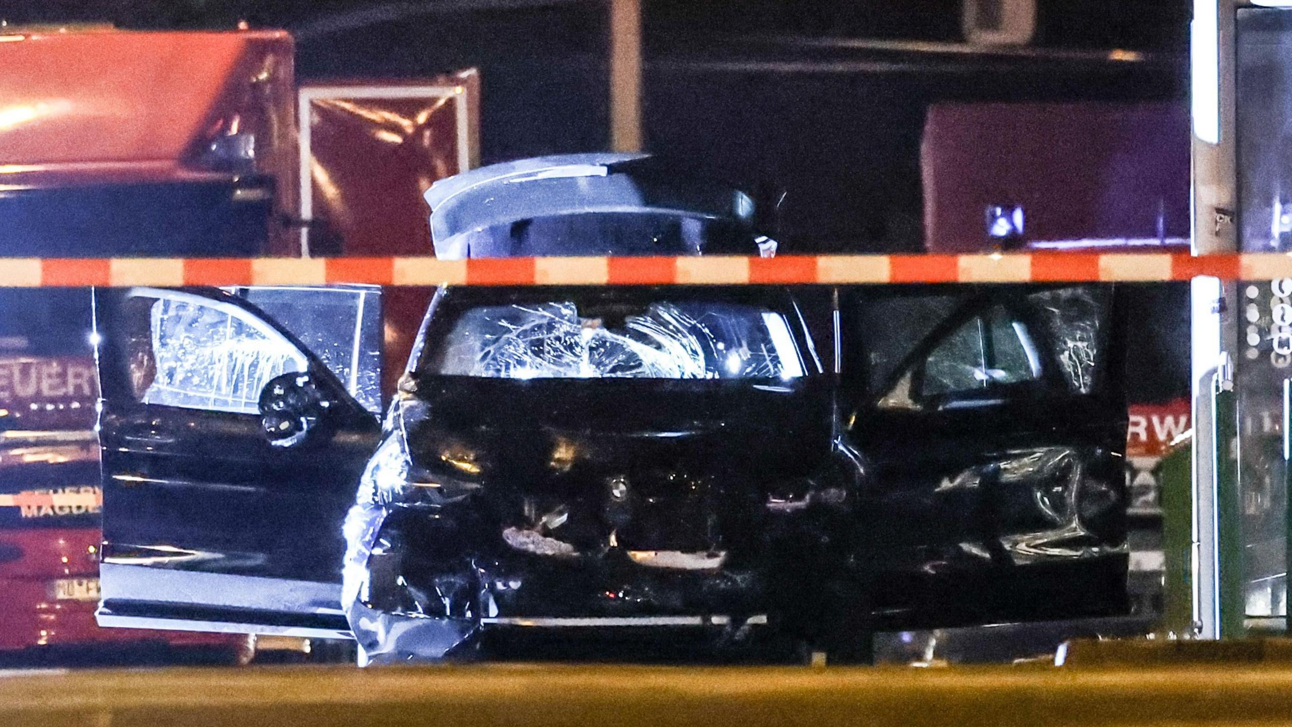 A damaged car at the scene after a car was driven into a crowd in Madgeburg