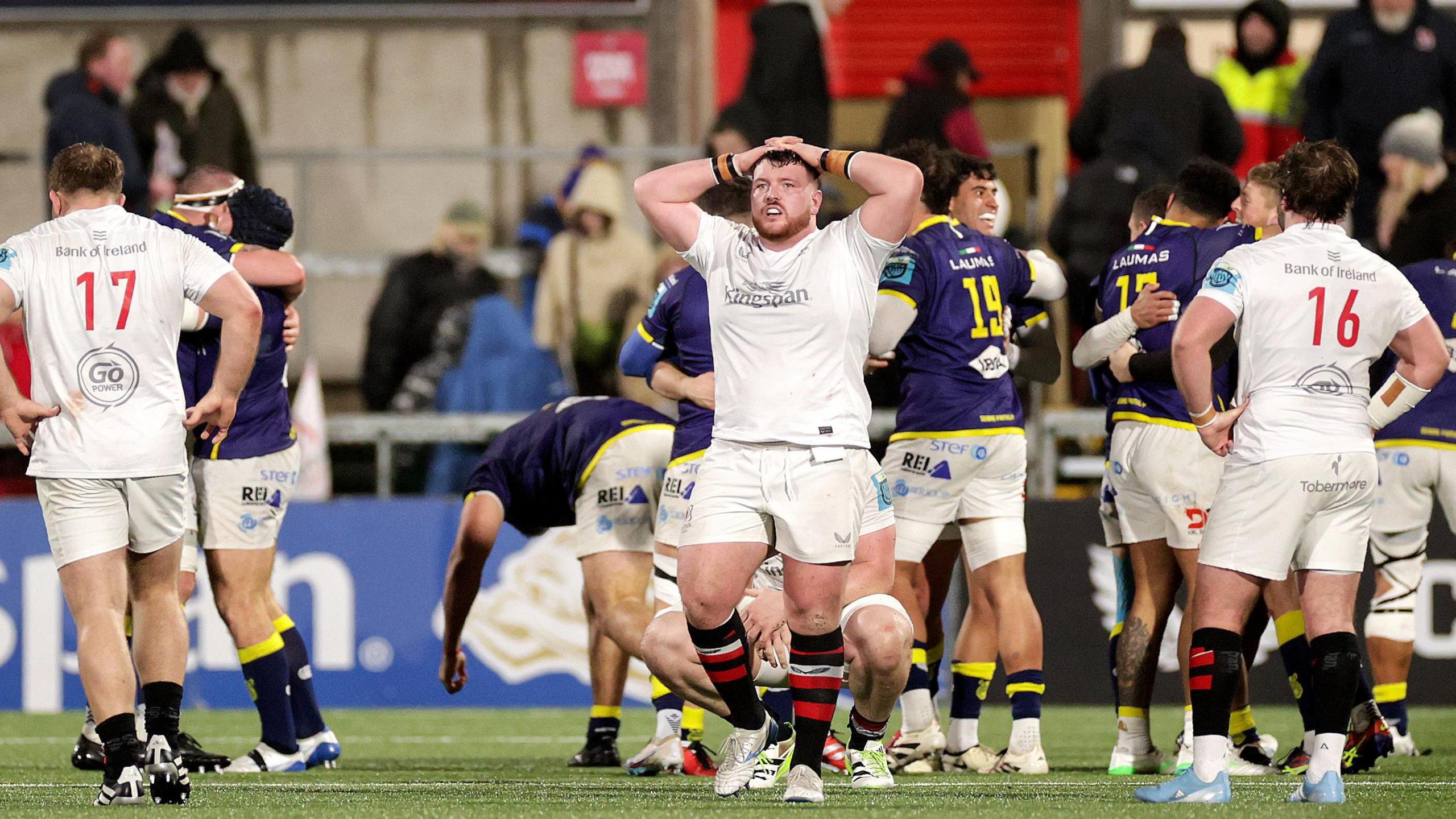 Corrie Barrett with his head in his hands after the final whistle