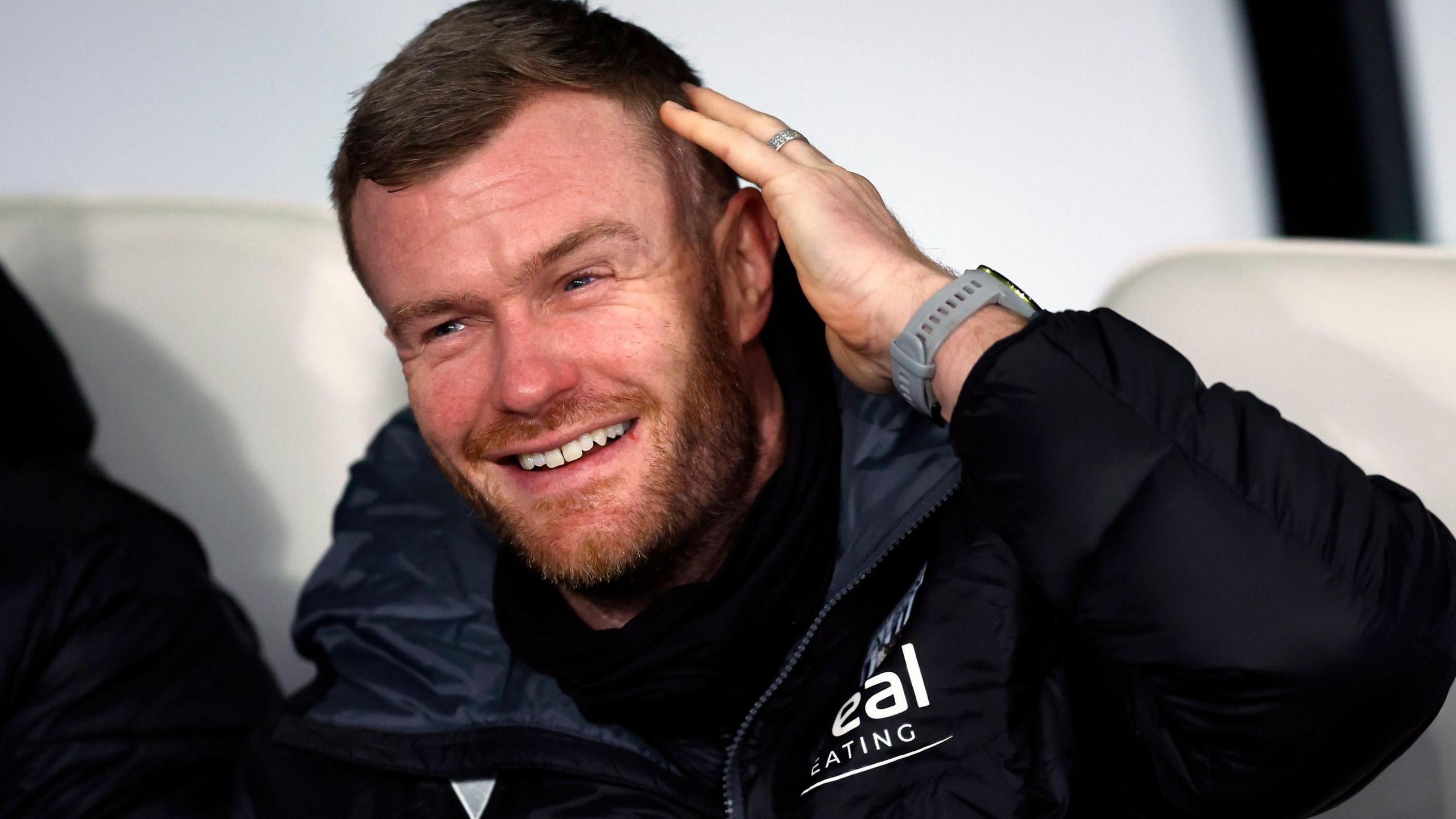 Albion joint caretaker boss Chris Brunt in the away dug-out at Bramall Lane