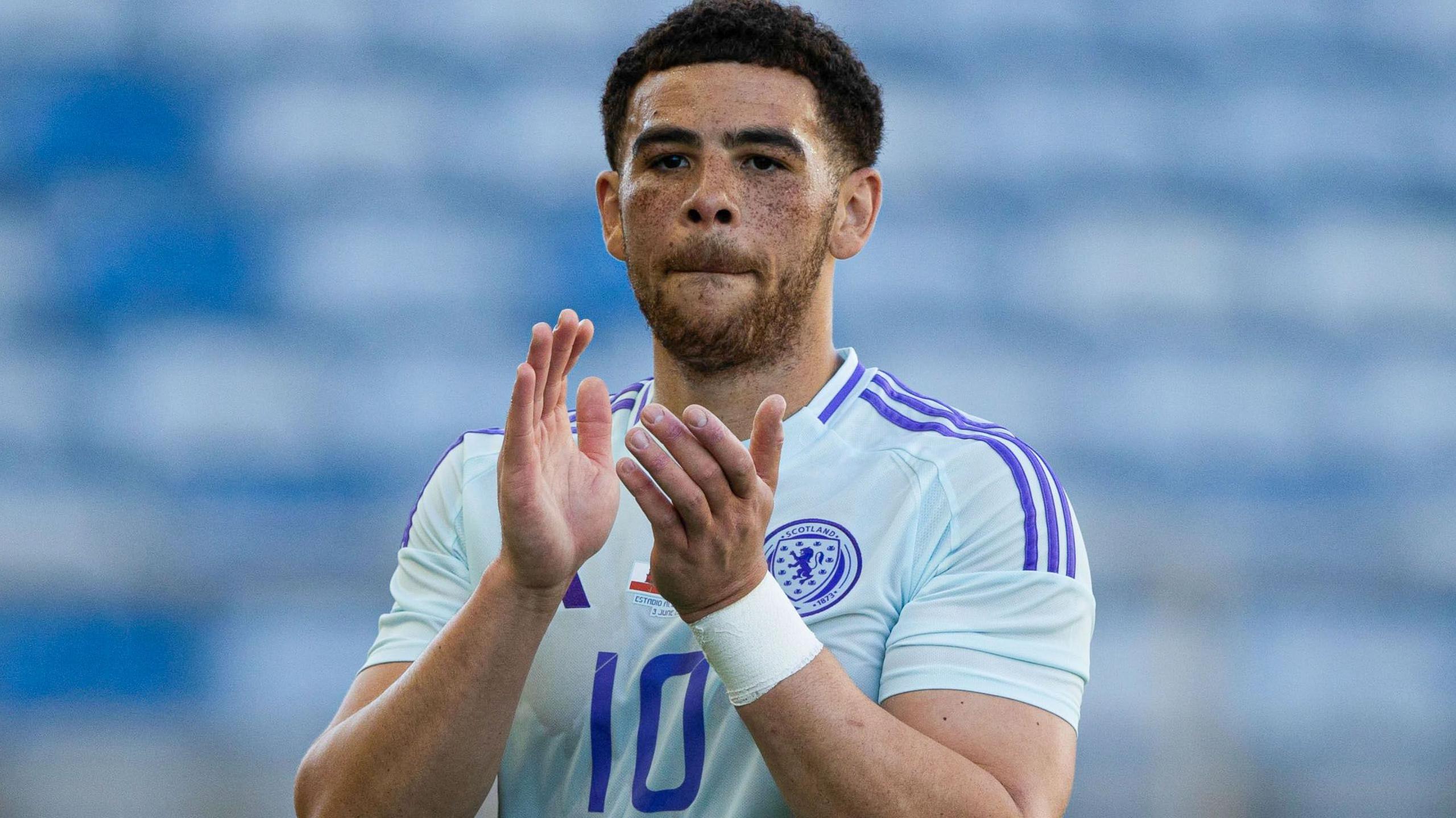 Che Adams applauds the support after Scotland's win over Gibraltar