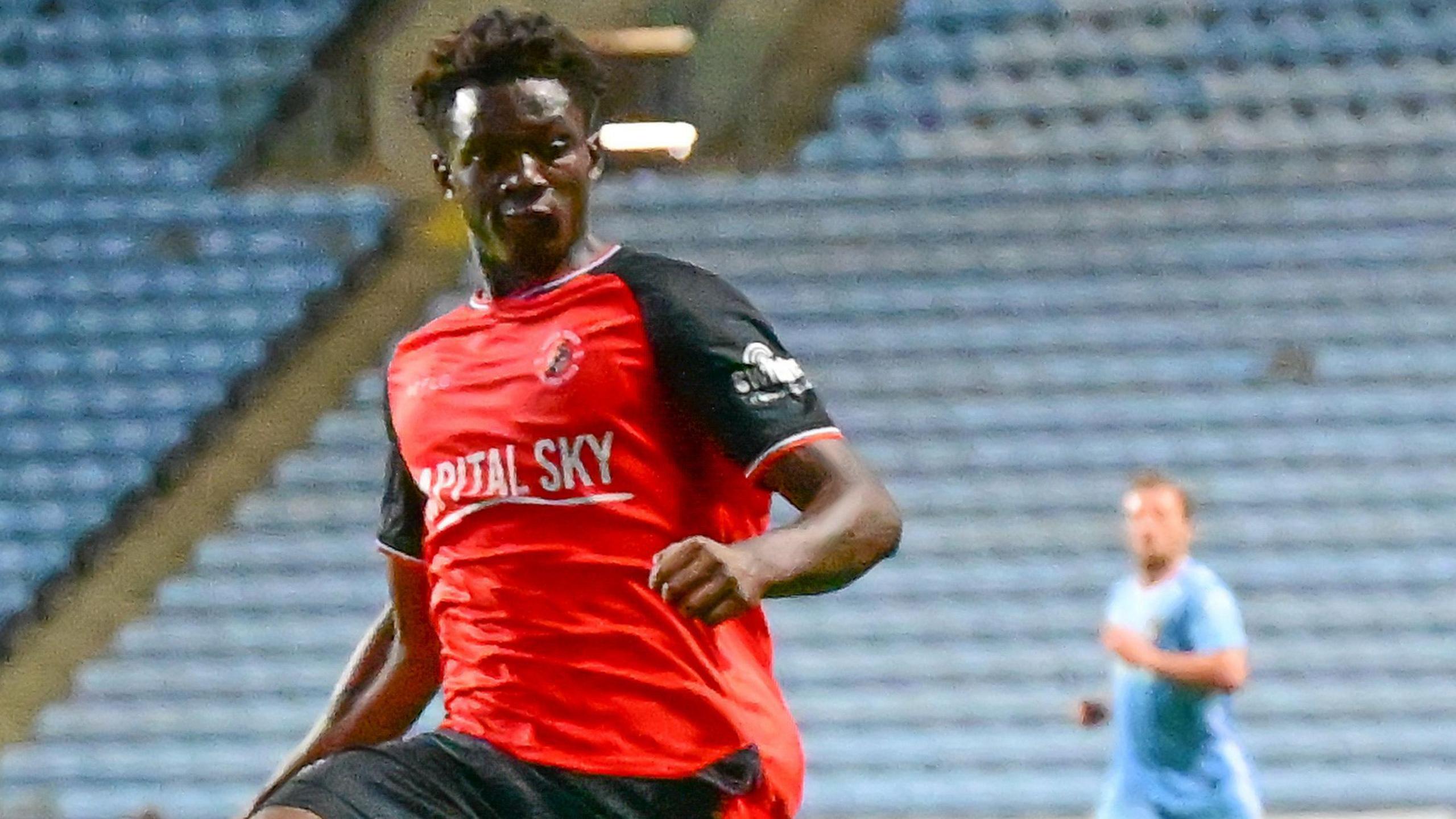 Christian Chigozie in action for Luton against Coventry City