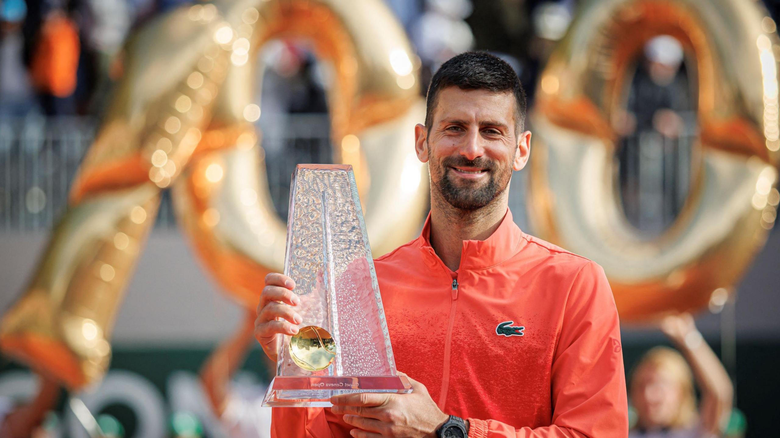Novak Djokovic lifts the Geneva Open trophy