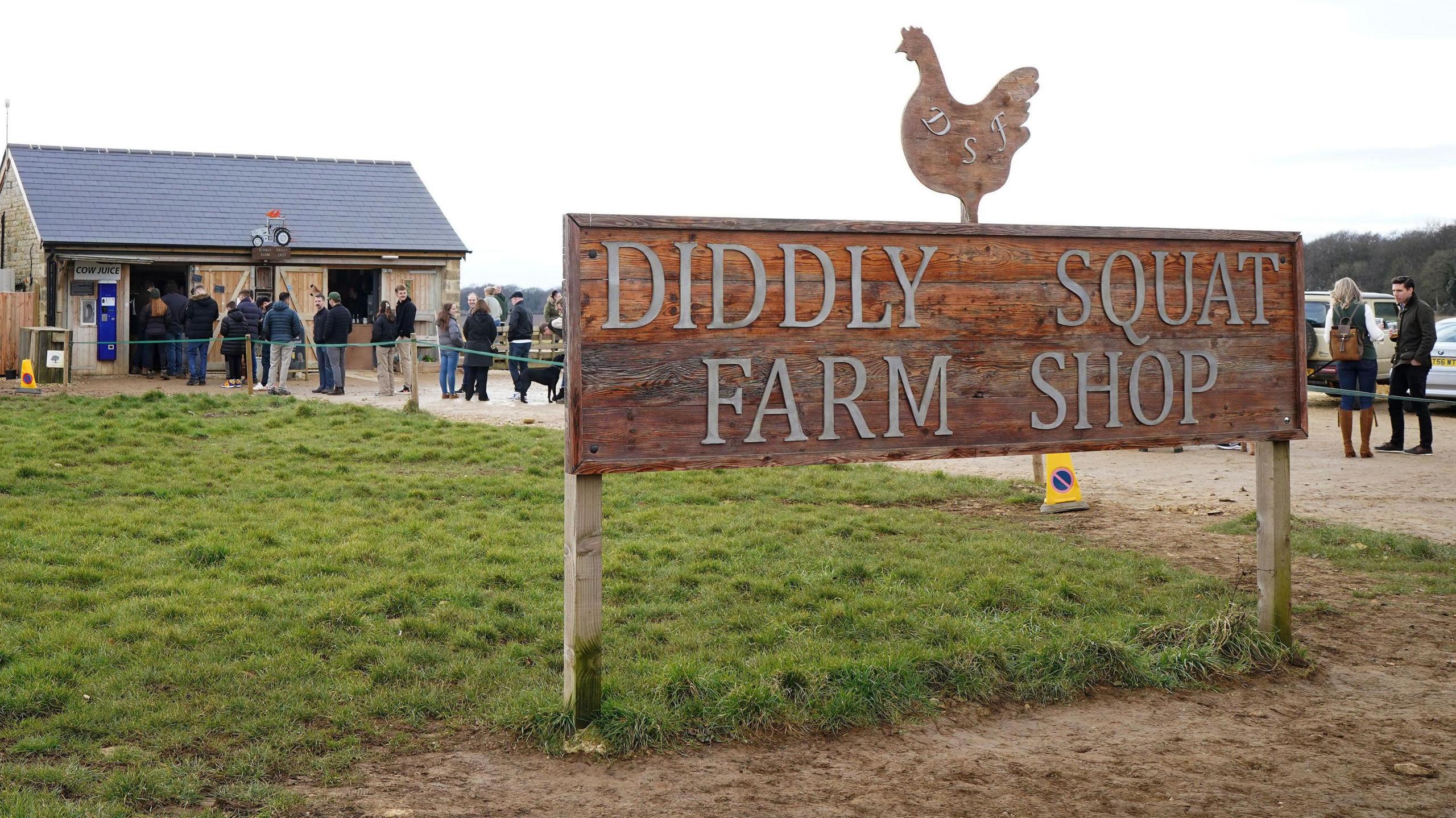 Customers queue to get into Jeremy Clarkson's Diddly Squat Farm Shop near Chadlington in Oxfordshire