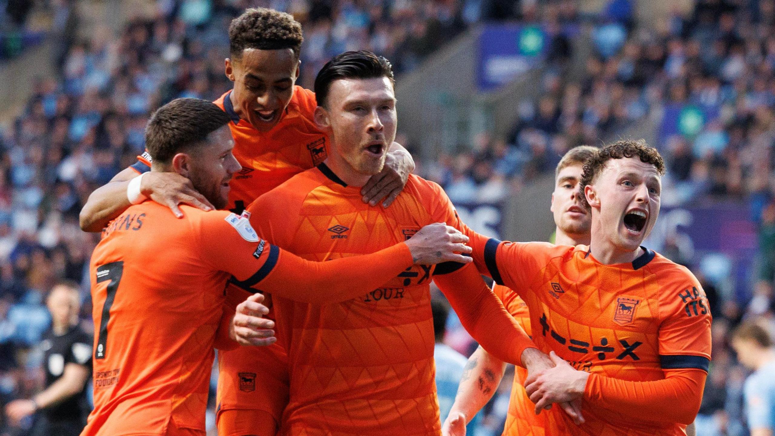 Kieffer Moore celebrates scoring Ipswich's eighth-minute opener at Coventry  