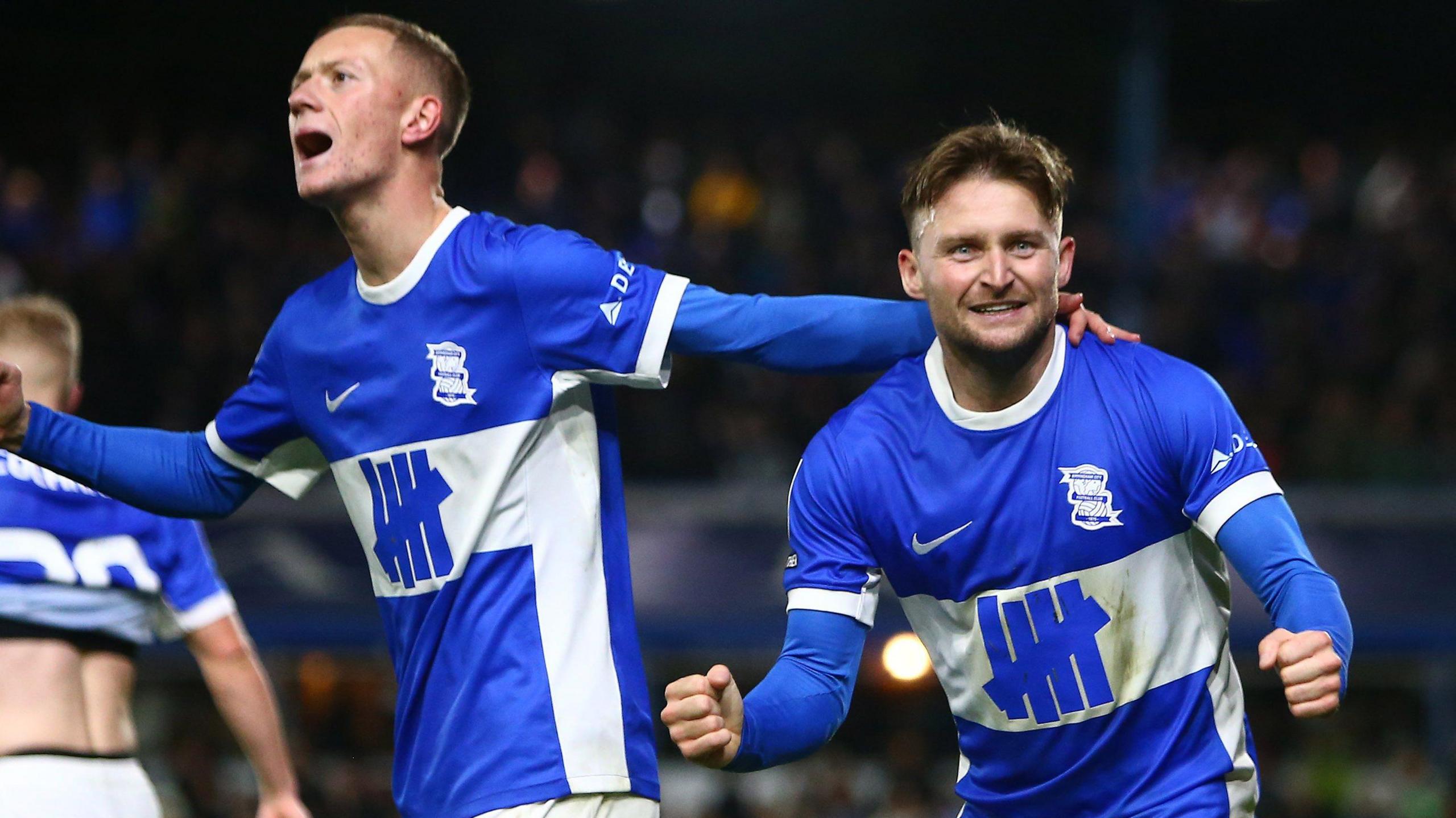 Alfie May celebrates scoring against Huddersfield Town with Birmingham City teammate Jay Stansfield 