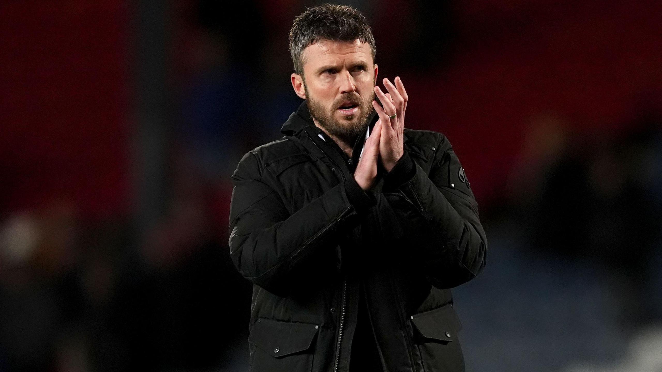 Middlesbrough boss Michael Carrick applauds the travelling Boro fans after the 2-0 win at Blackburn