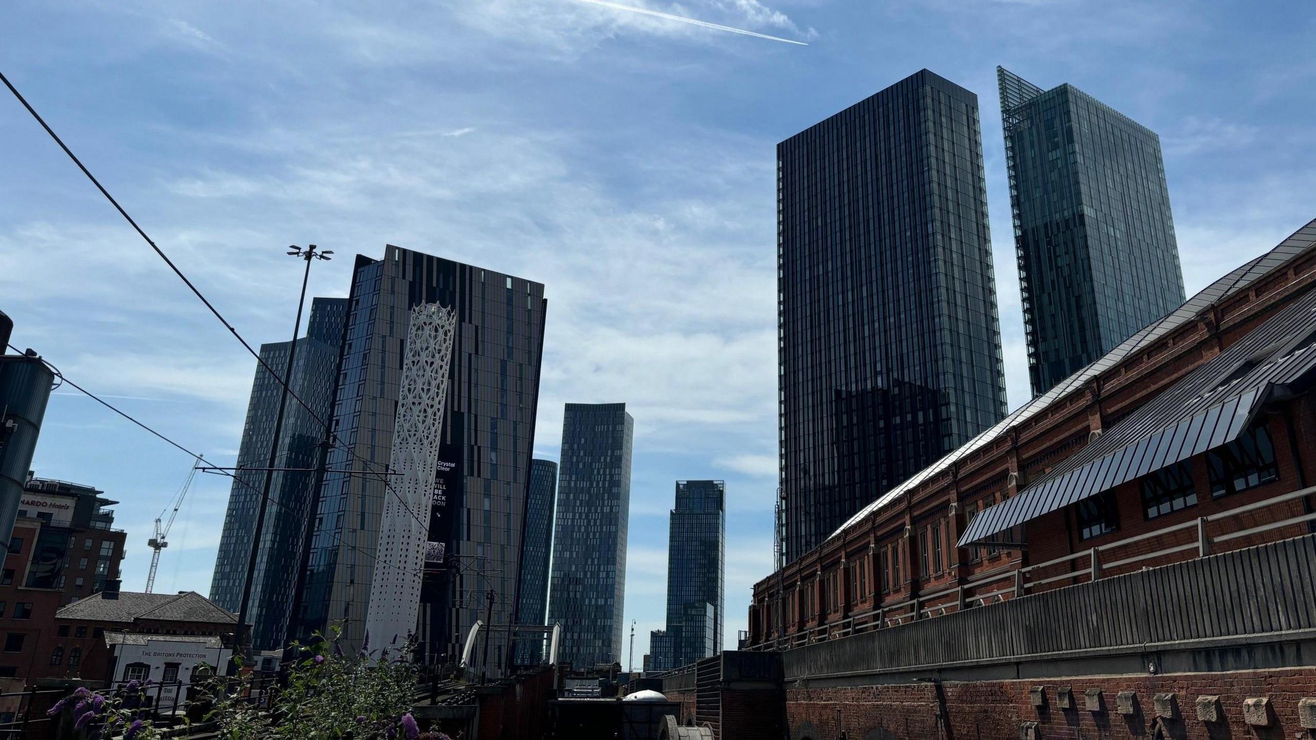 Manchester's high rise buildings tower over the city centre