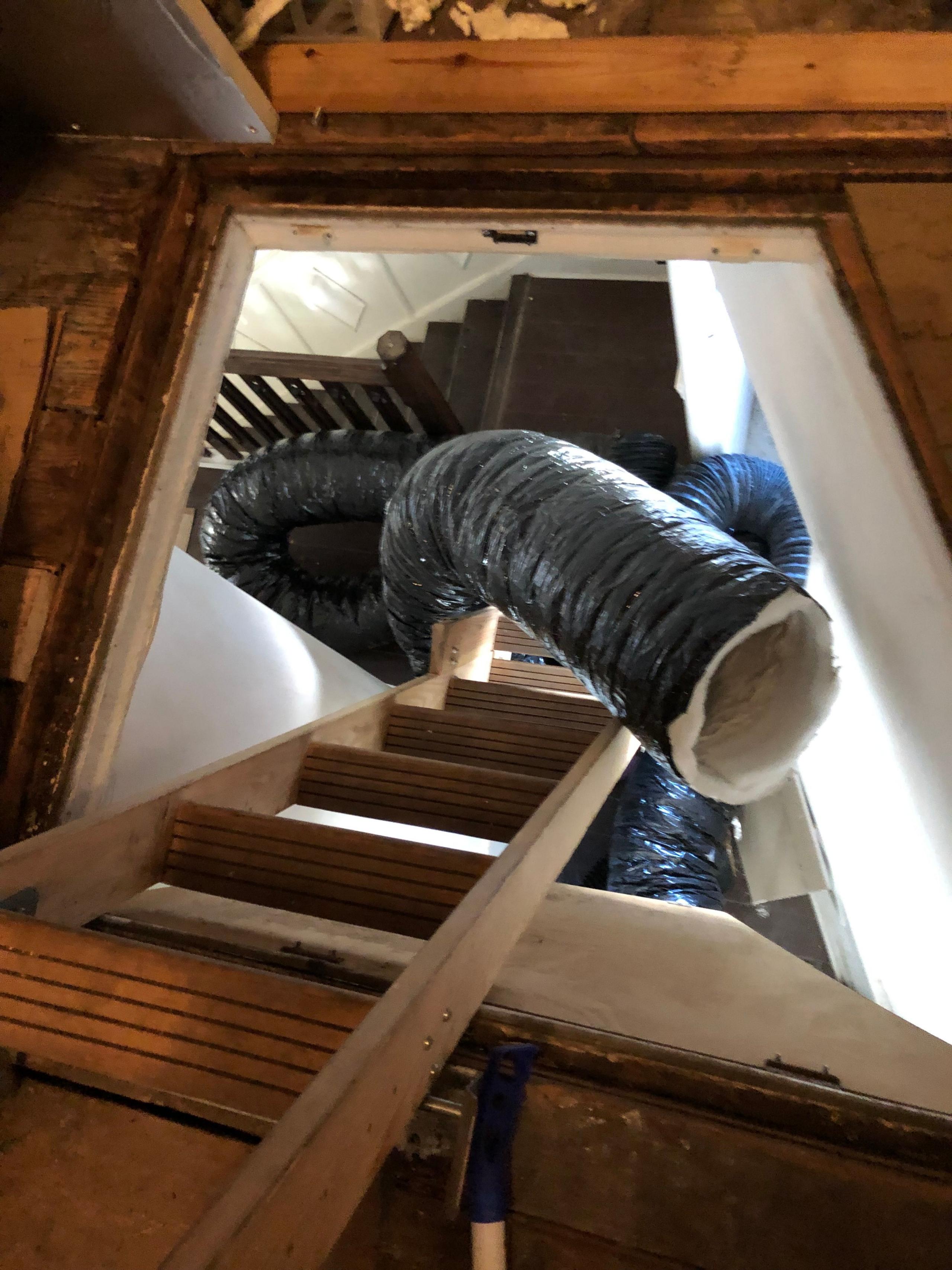 A black ventilation tube inside Ms Rao- Reed's home