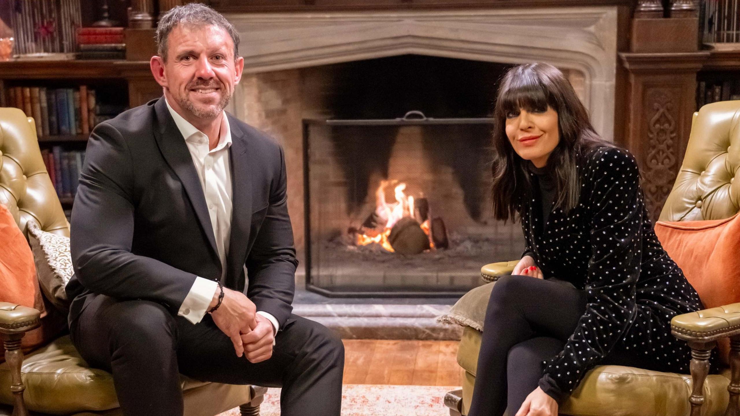 Andrew Jenkins pictured with Traitors host Claudia Winkleman. 