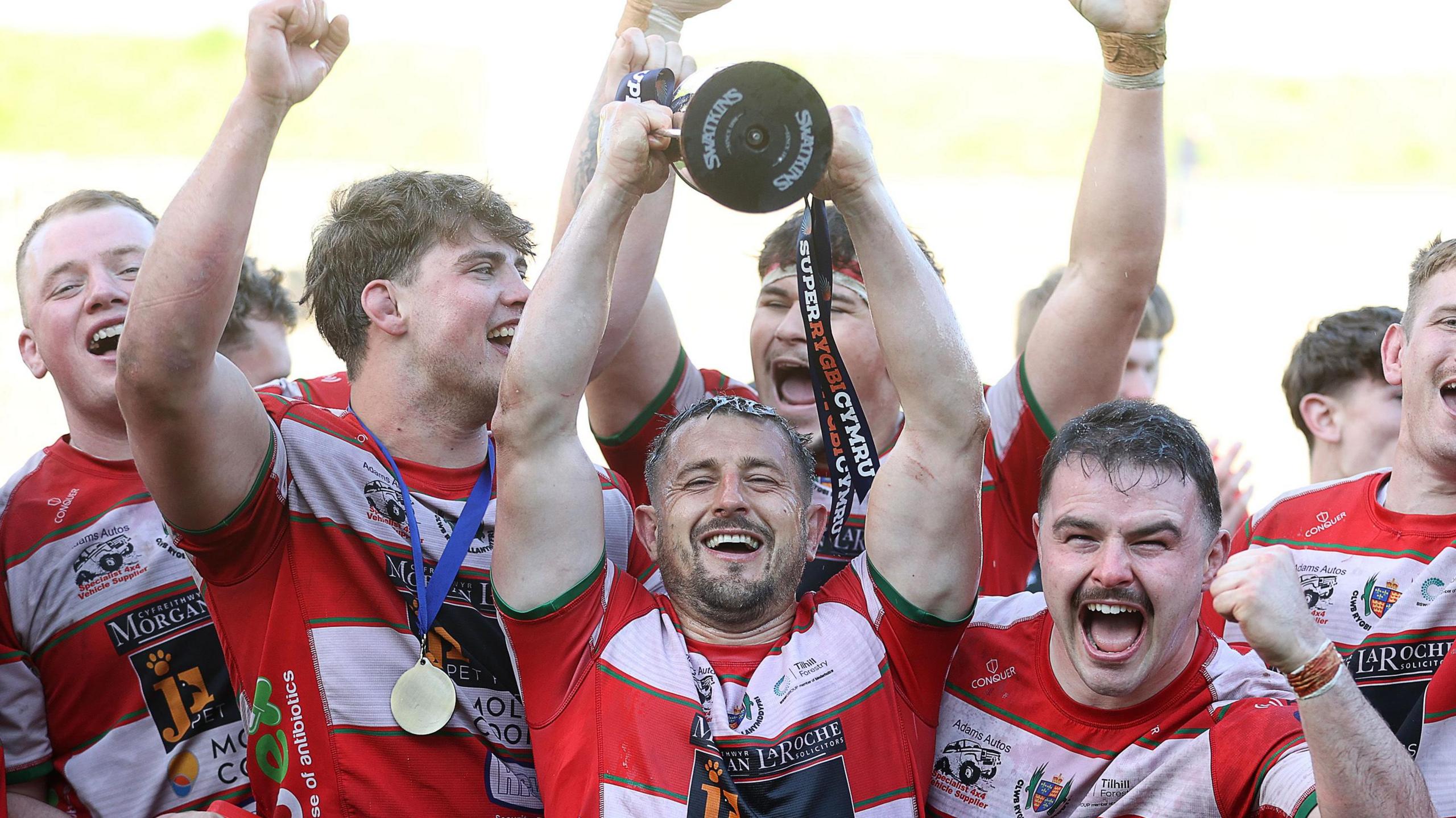 Lee Rees lifts the Super Rygbi Cymru trophy for Llandovery