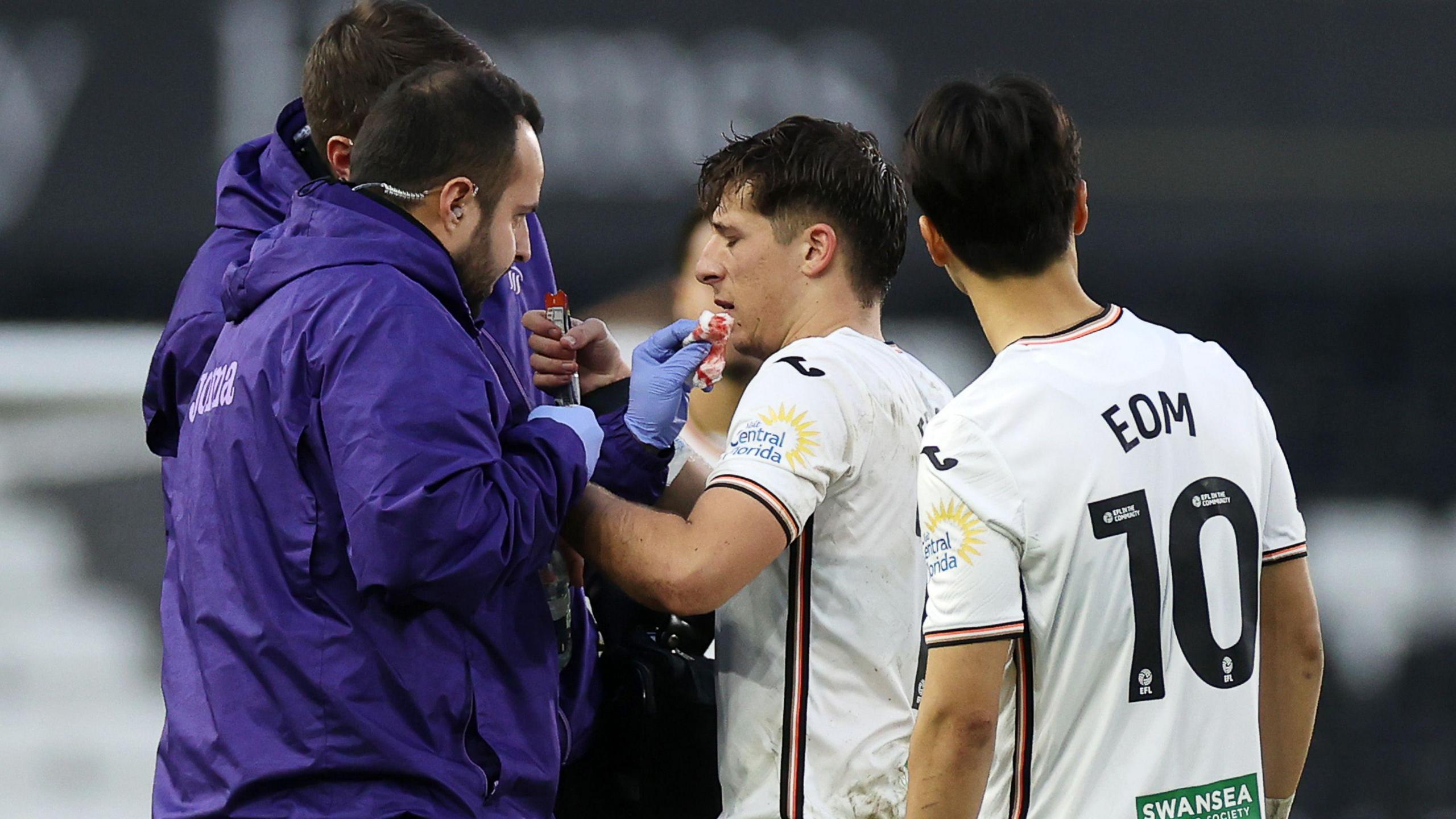 Goncalo Franco receives treatment on his mouth