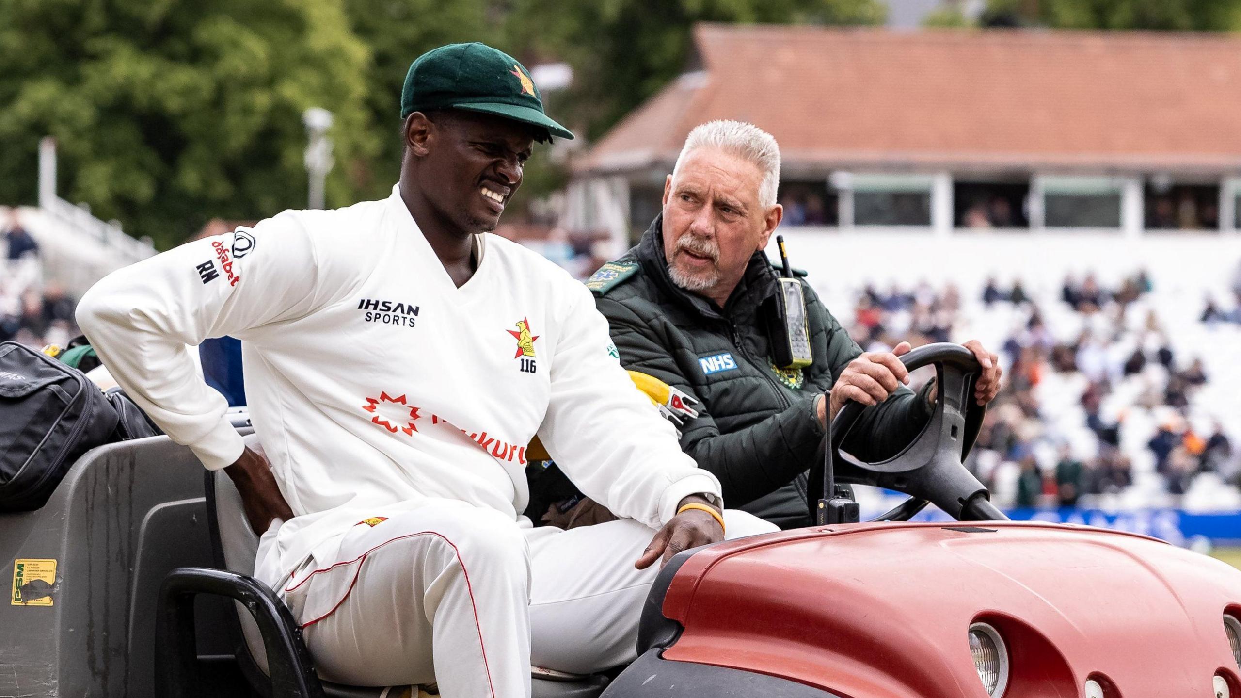 Richard Ngarava leaves the field on a tractor