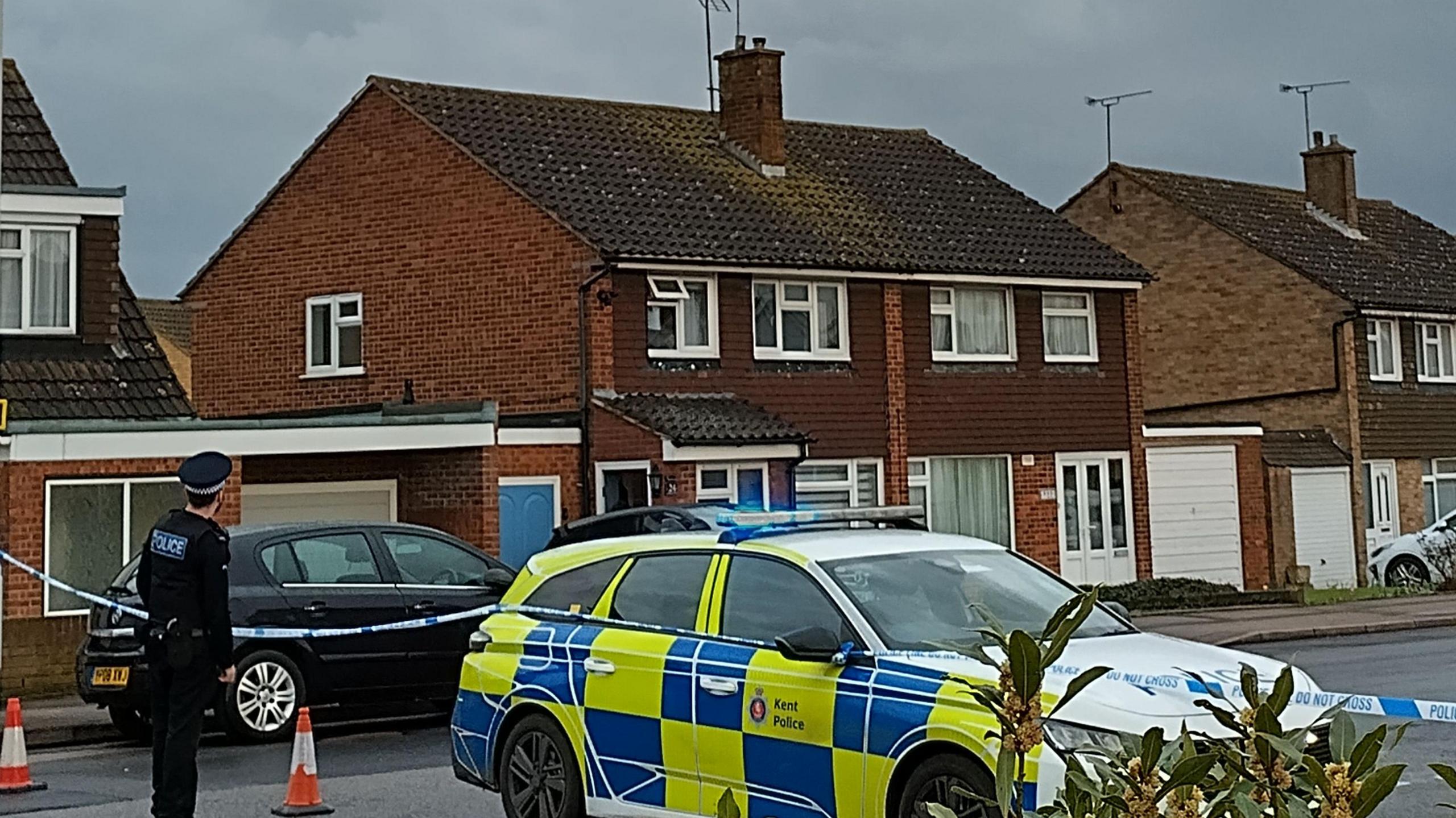 Police outside an address in Adelaide Drive