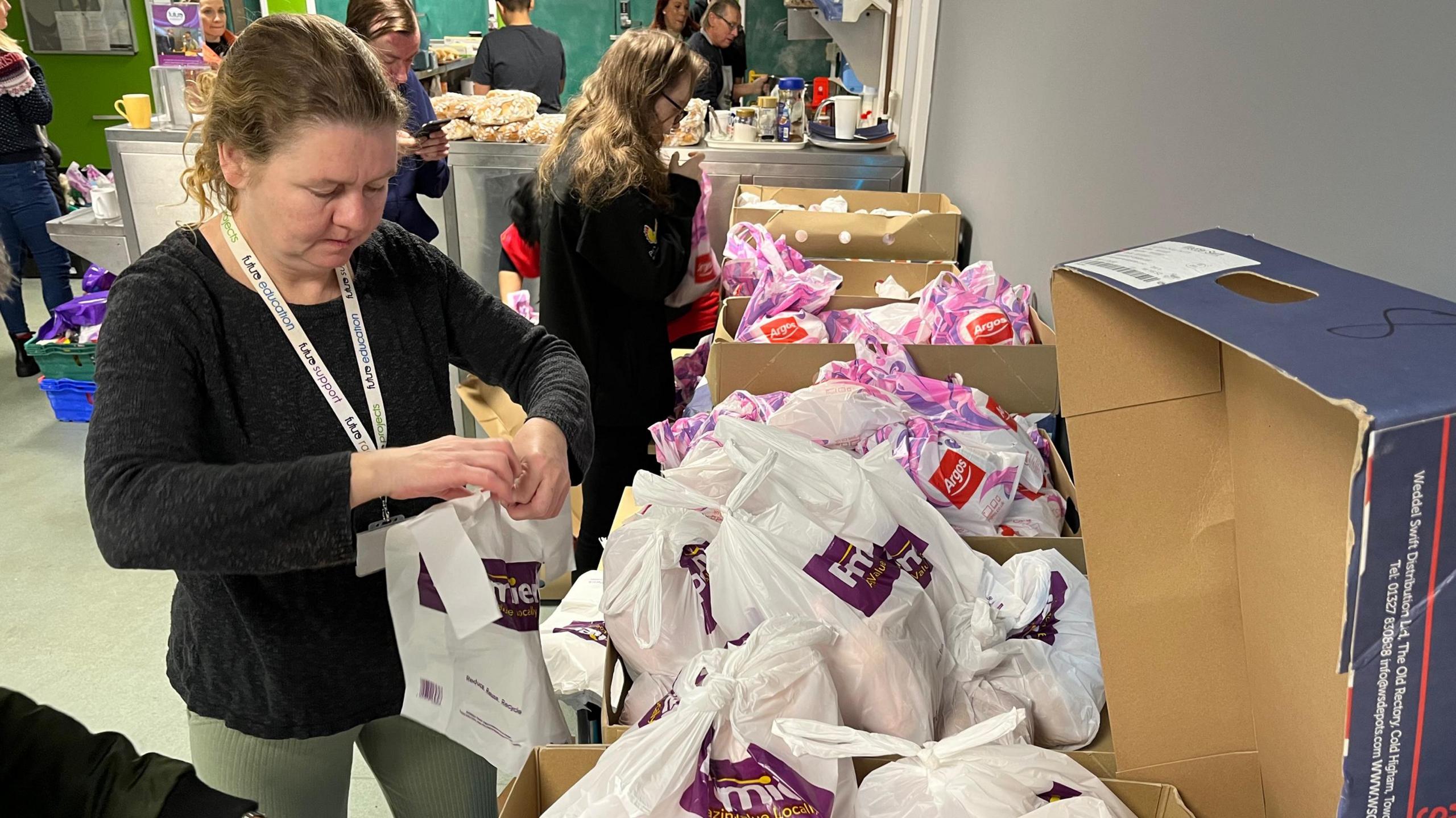 Christmas hampers being packed