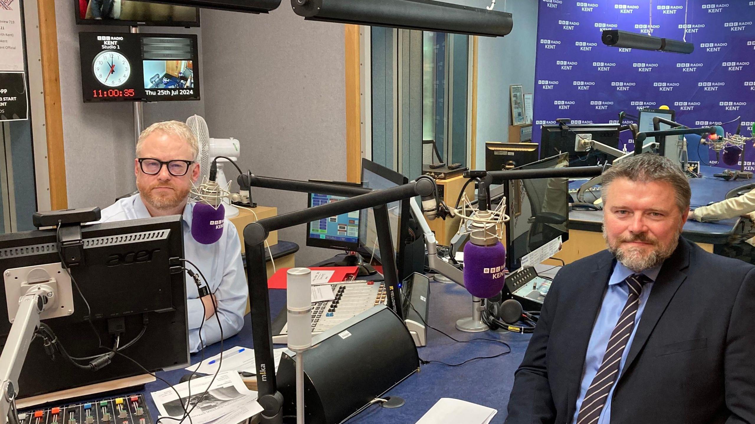 Chief Constable Tim Smith in the BBC Radio Kent studio with presenter Dominic King