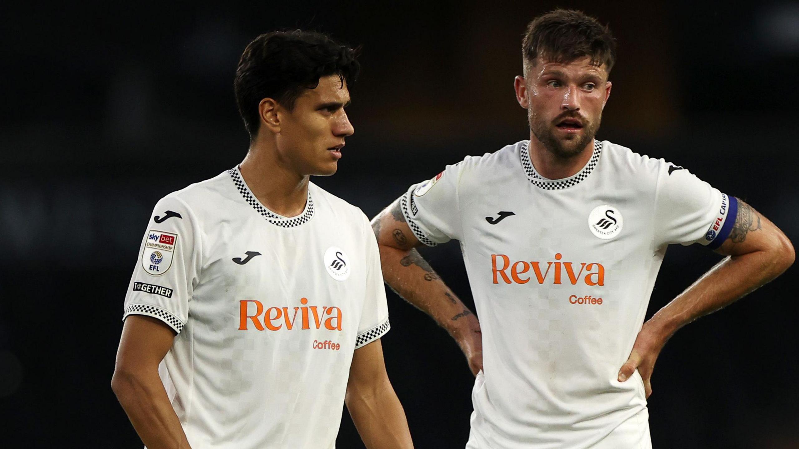 Marko Stamenic and Cameron Burgess in Swansea City kits