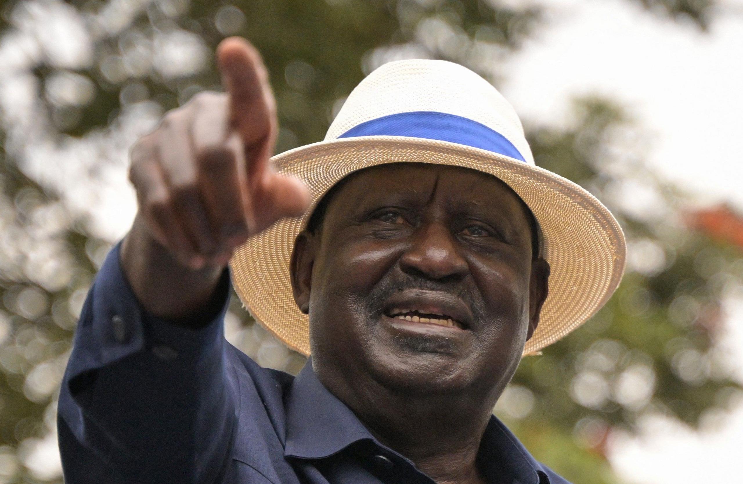 An upper body shot of Raila Odinga, wearing a hat and pointing with his right hand, pictured in an archive image from 2023.