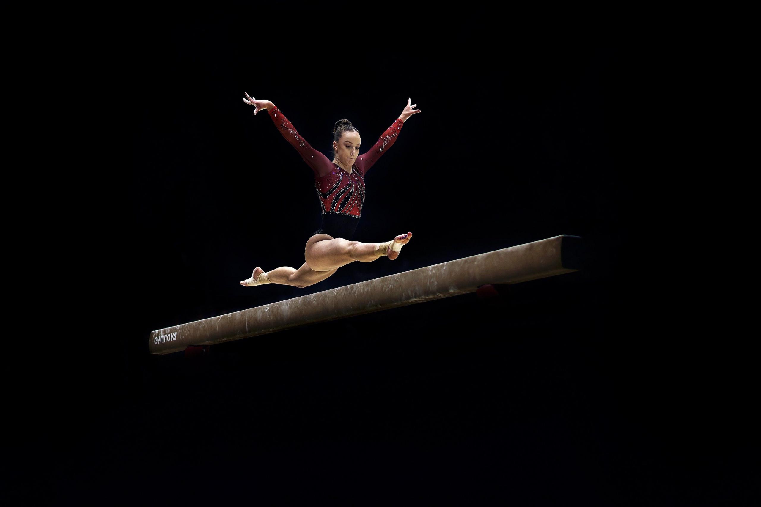 Tahlia Wyatt performs on the beam during the artistic junior competition at the British Gymnastics Championships in Liverpool