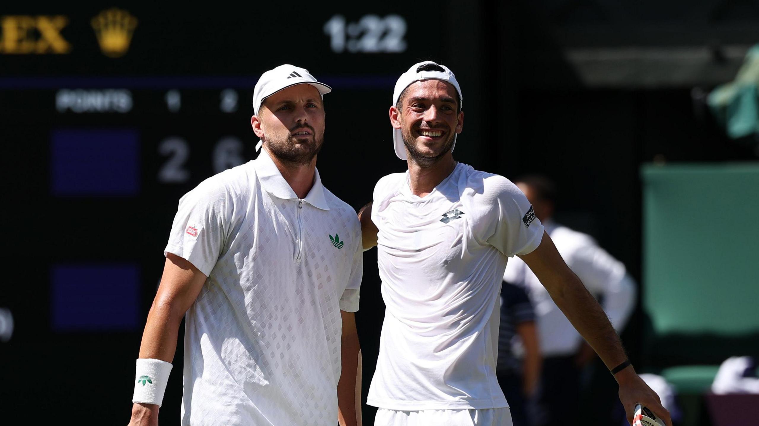 Lloyd Glasspool and Julian Cash after their Wimbledon men's doubles win on Centre Court Wimbledon