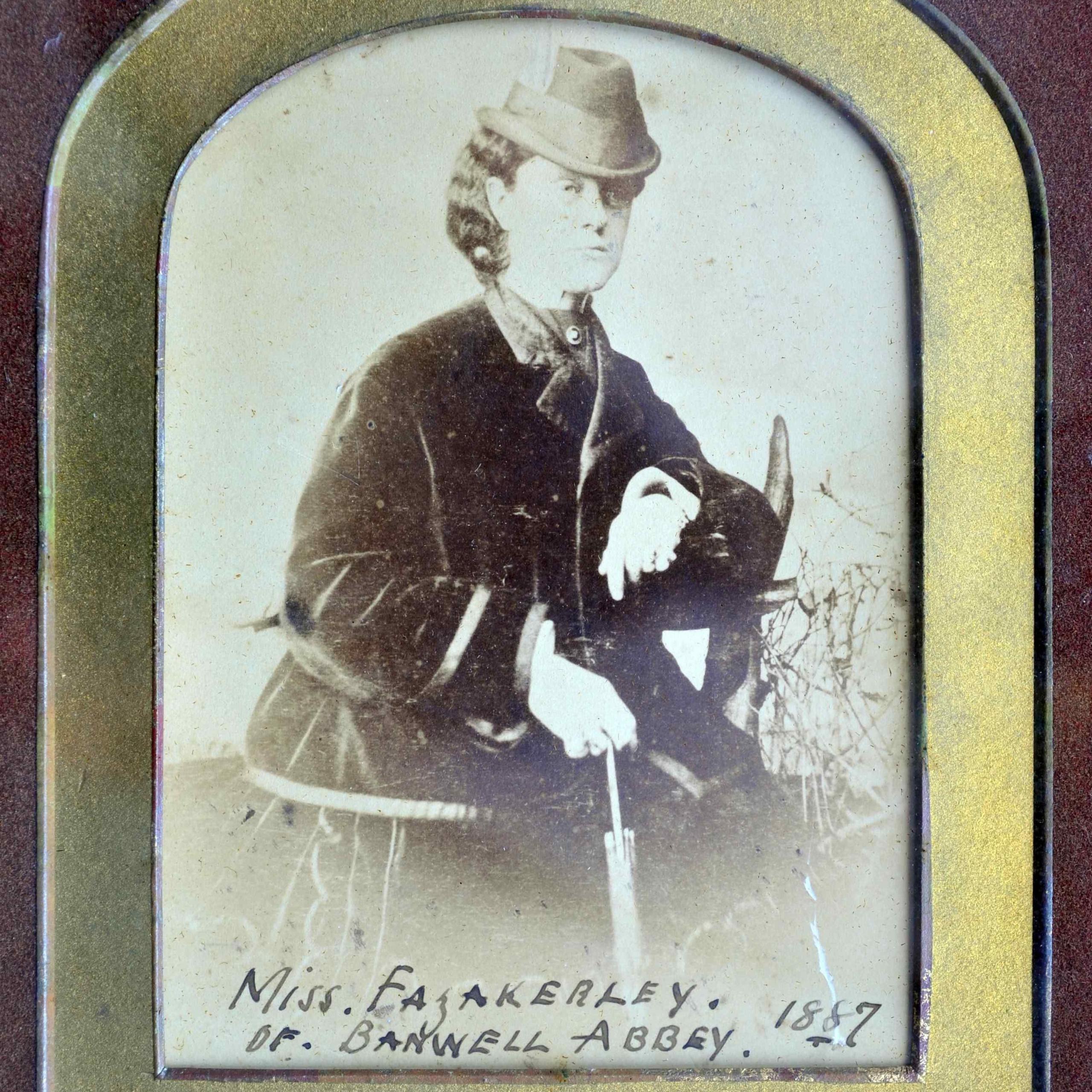 Emily posing for a photograph with parasol in hand. Finely dressed, this was taken from her time living at Banwell Abbey in Somerset where she move to in 1883, because of her failing health